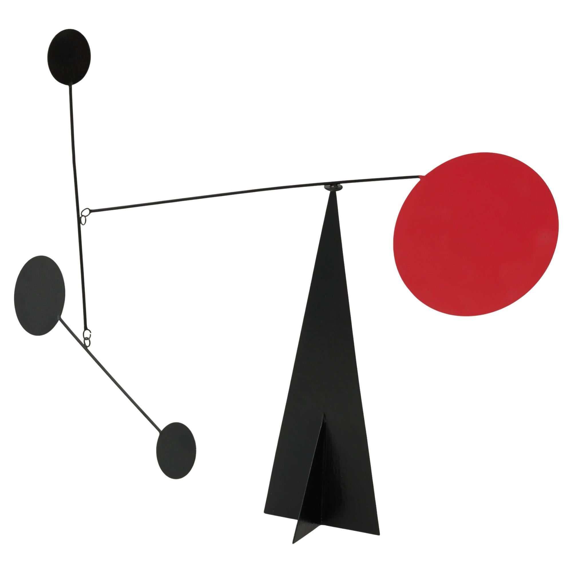 Vibrant Motion: Kinetic Sculpture - Iron, Paint, Movement