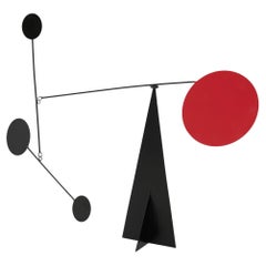 Vibrant Motion: Kinetic Sculpture - Iron, Paint, Movement