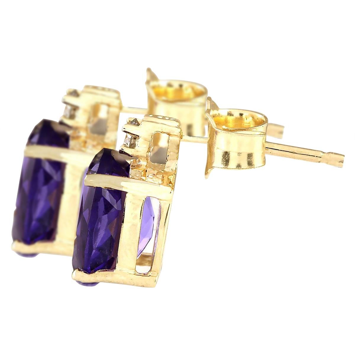 Presenting our exquisite 2.55 Carat Amethyst Earrings, crafted in luxurious 14K Yellow Gold. These enchanting earrings feature two stunning amethyst gemstones, totaling 2.50 carats, each measuring 8.00x6.00 millimeters, exuding a captivating purple