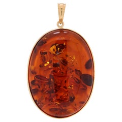 Pendentif d'ambre ovale en or jaune 18 carats
