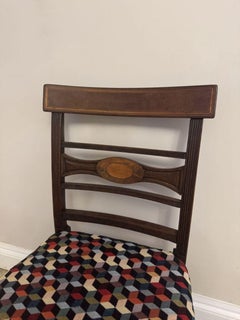 Vibrant pair of antique Regency mahogany inlaid pair of chairs