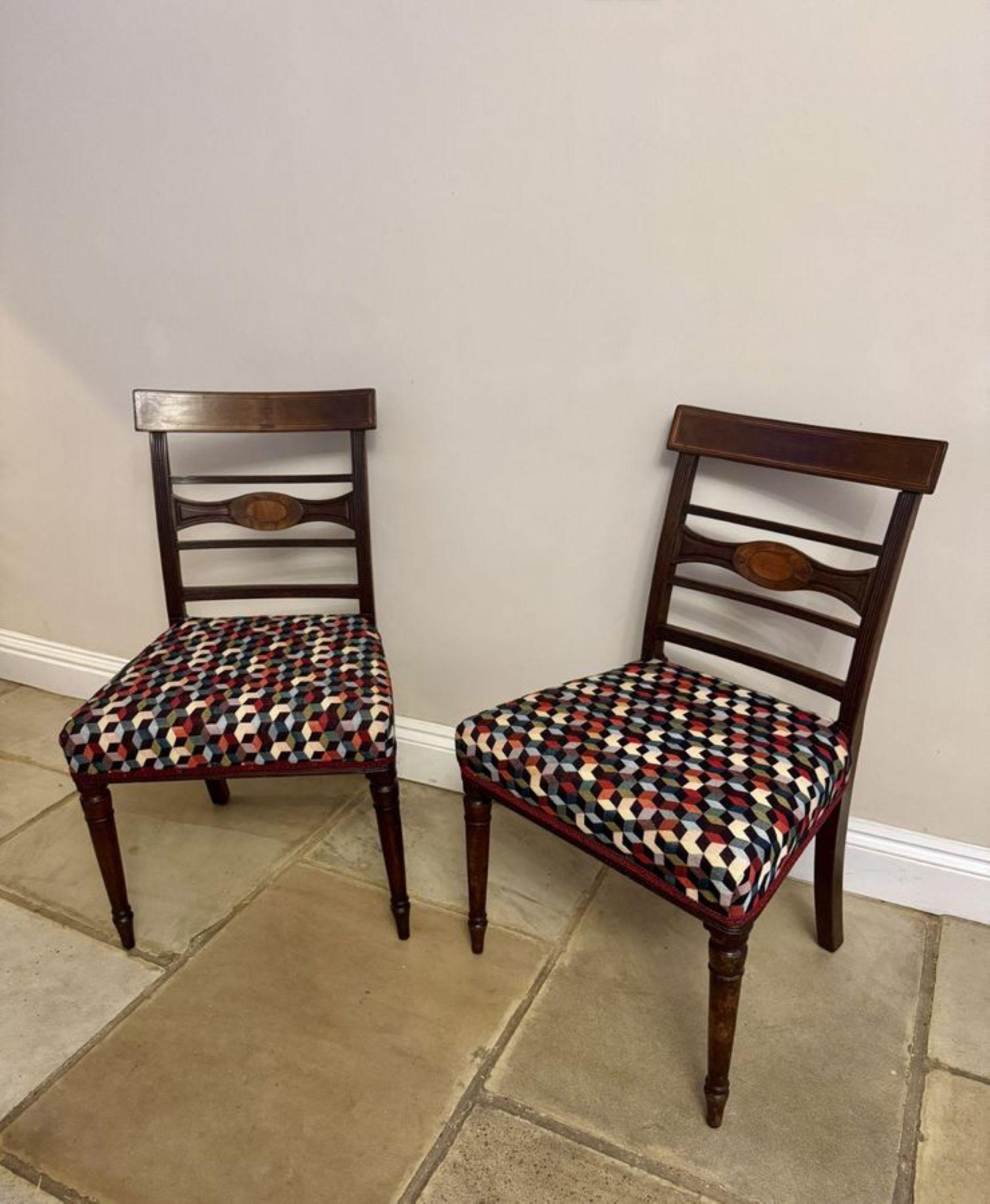 Vibrant pair of antique Regency mahogany inlaid pair of chairs For Sale