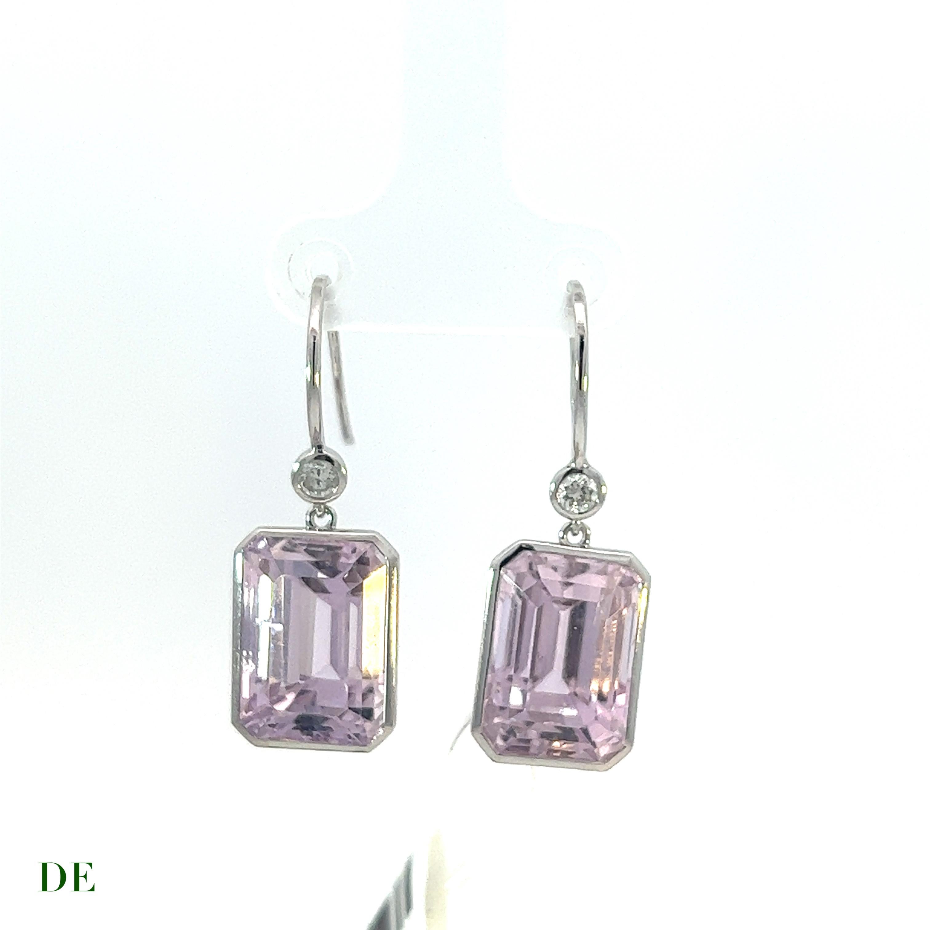 Vibrant Pink Barbie Kunzite Earring 22.18crt with .176crt white diamond earring

Introducing the exquisite and captivating Vibrant Pink Barbie Kunzite Earring, adorned with a staggering 22.18 carat gem of unparalleled beauty. Its mesmerizing pink