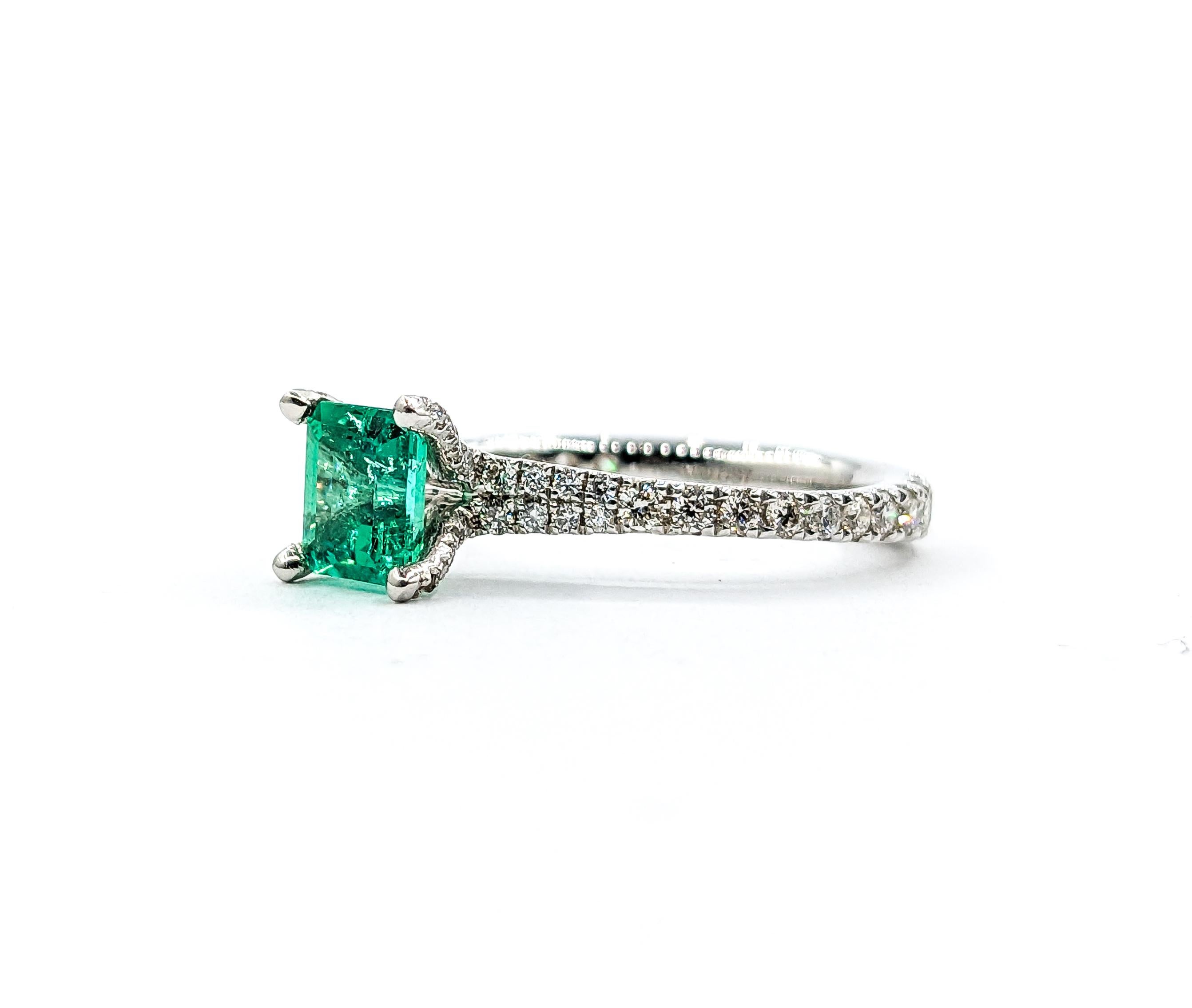 Vibrant Platinum Colombian Emerald & Diamond Ring

Indulge in the captivating elegance of this 950 platinum ring, boasting a mesmerizing .82 carat natural Colombian emerald. Further enhancing the gorgeous centerstone are .46 carats of sparkling