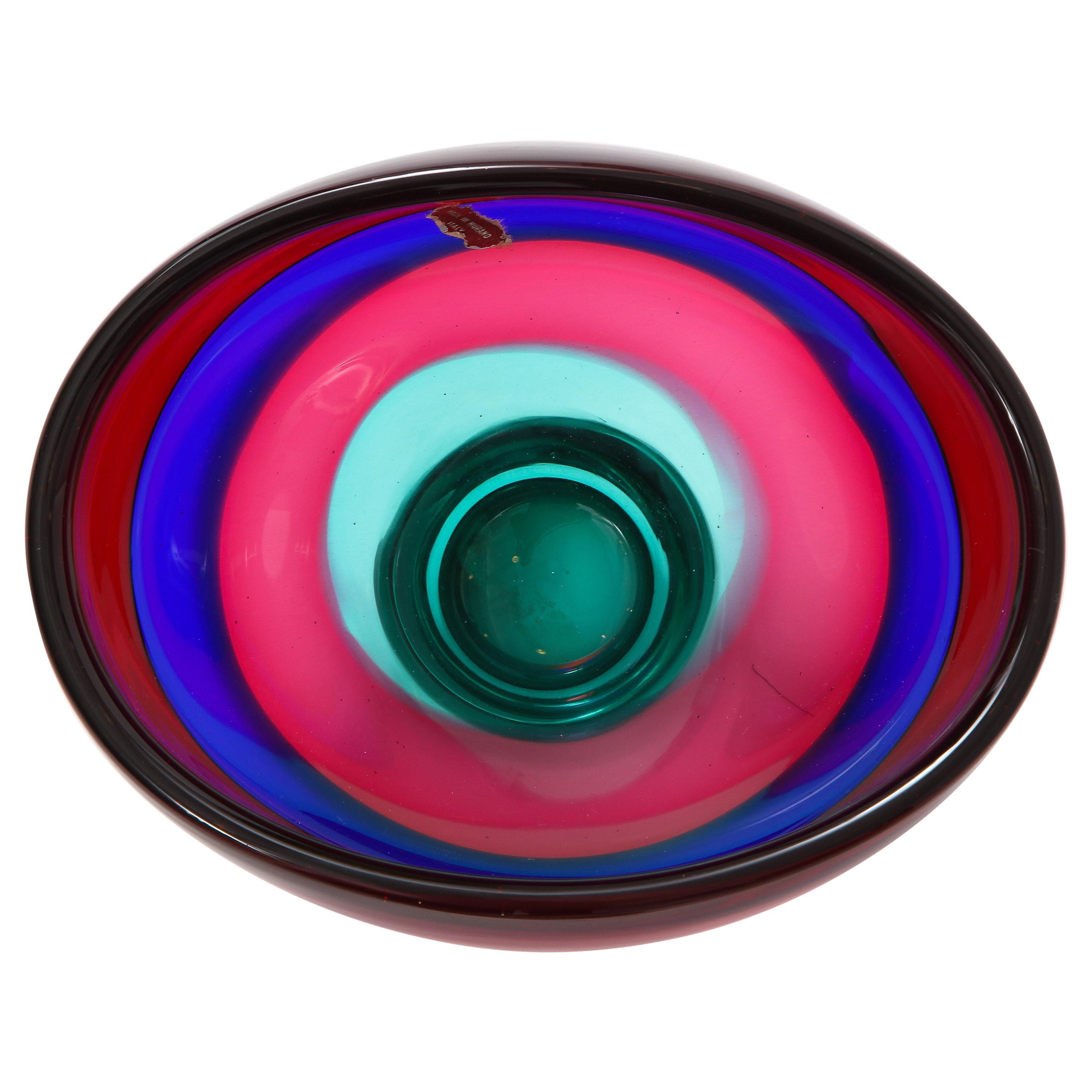 Vibrant red blue and green Murano glass bowl by Fluvio Bianconi.
Bearing the sticker: Murano made in Italy.
  