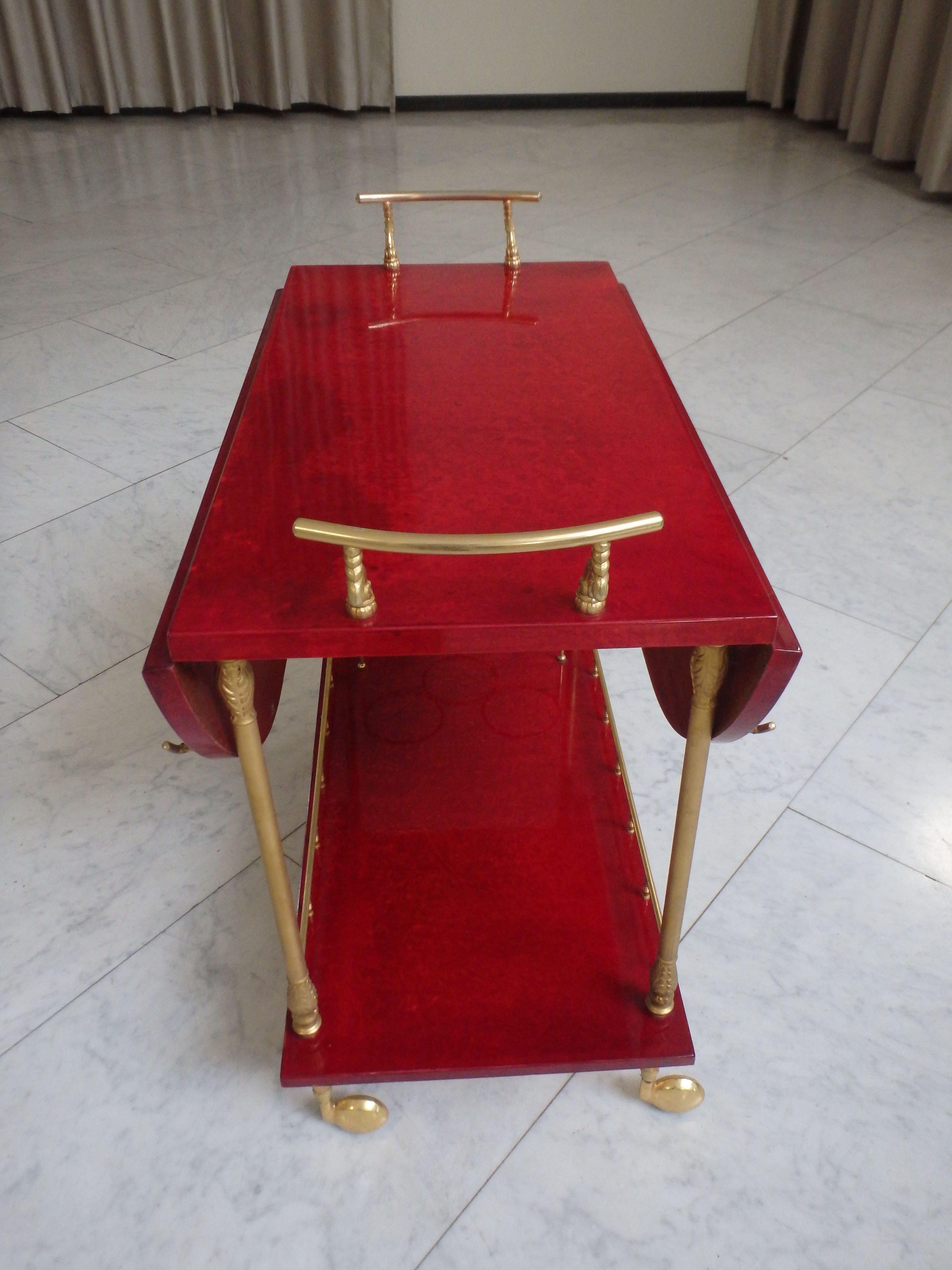 vibrant red coat skin bar cart by ALDO TURA with wings to be opend For Sale 3