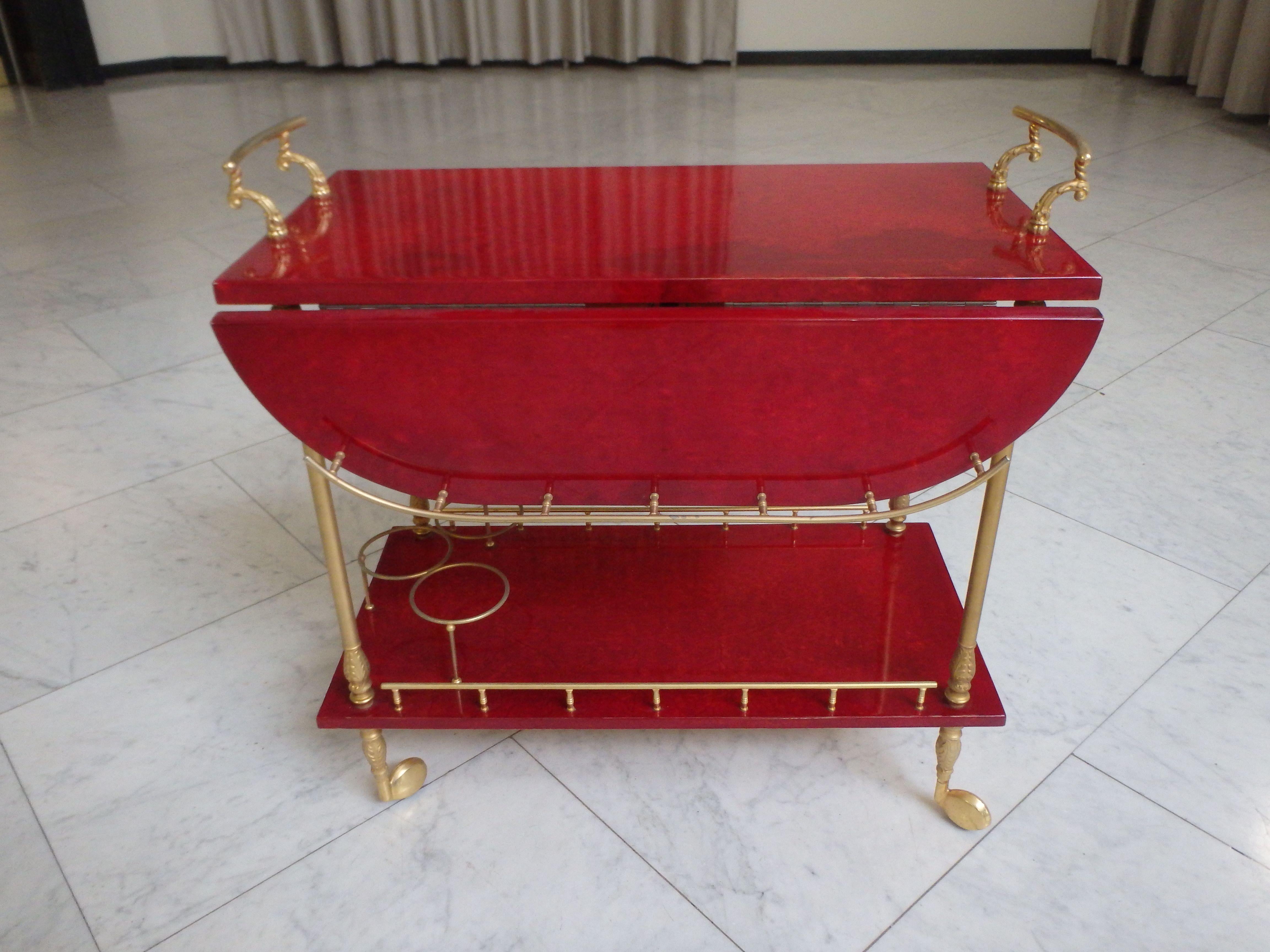 vibrant red coat skin bar cart by ALDO TURA with wings to be opend For Sale 4