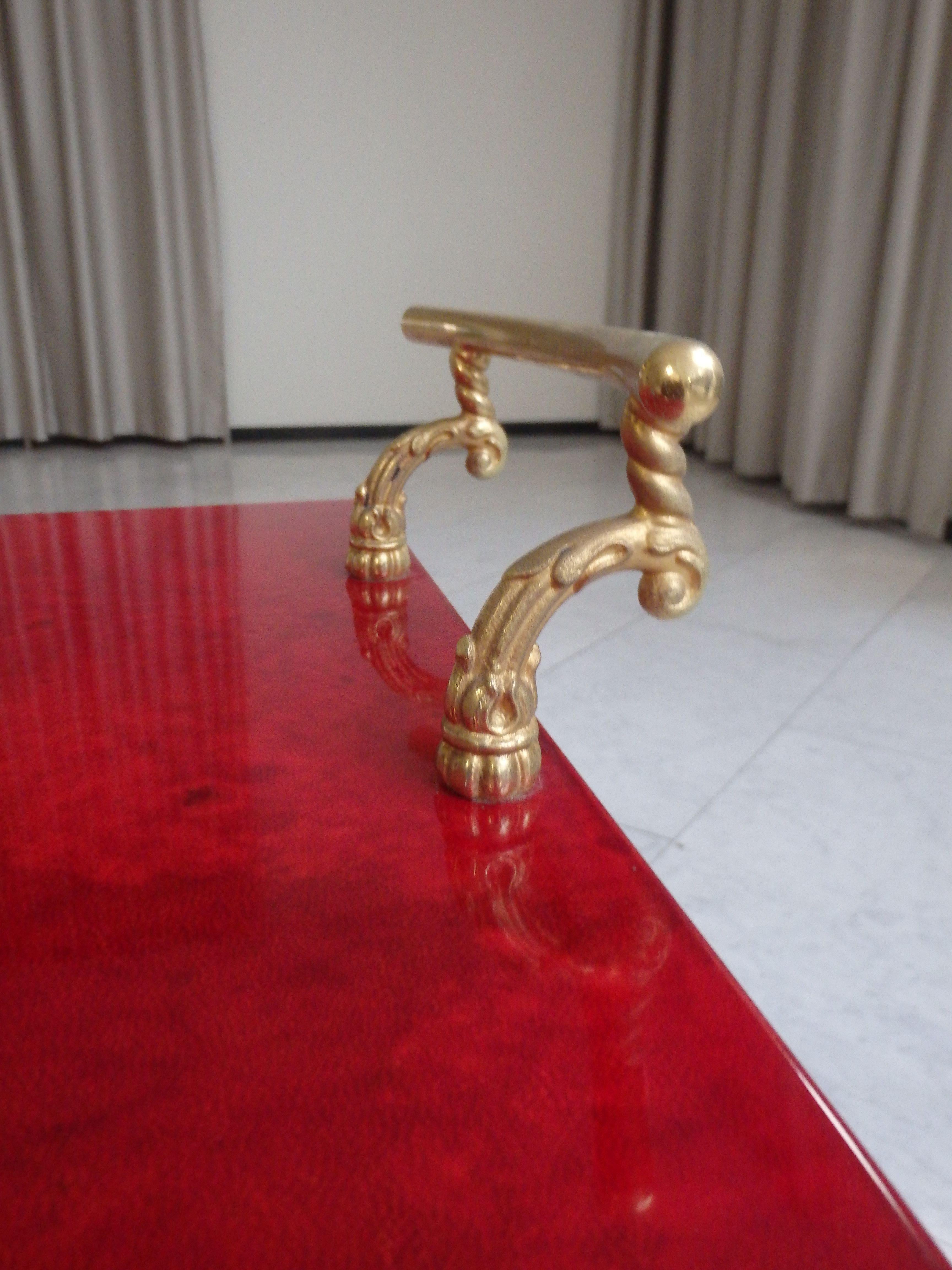 vibrant red coat skin bar cart by ALDO TURA with wings to be opend For Sale 6