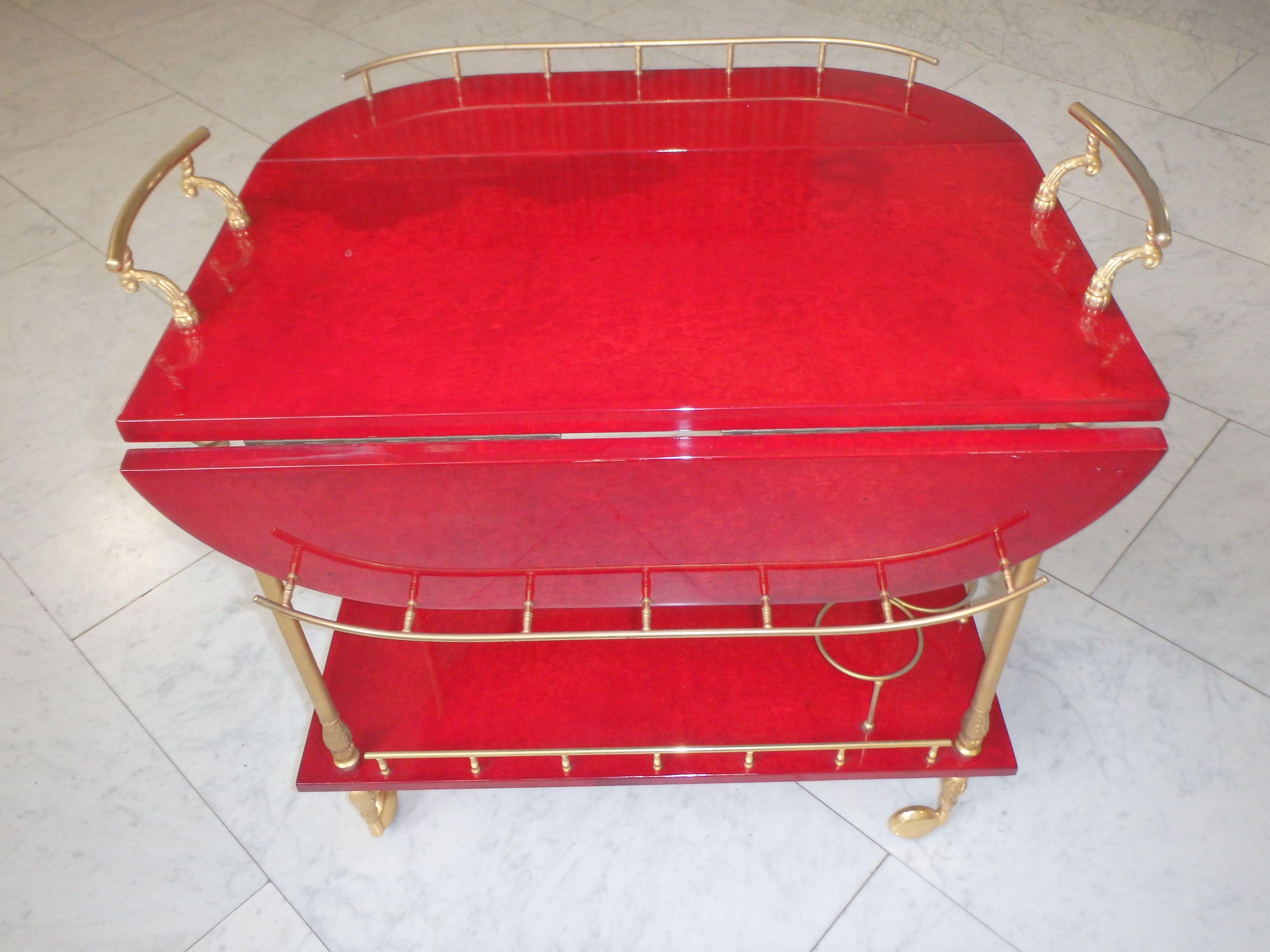 Mid-20th Century vibrant red coat skin bar cart by ALDO TURA with wings to be opend For Sale