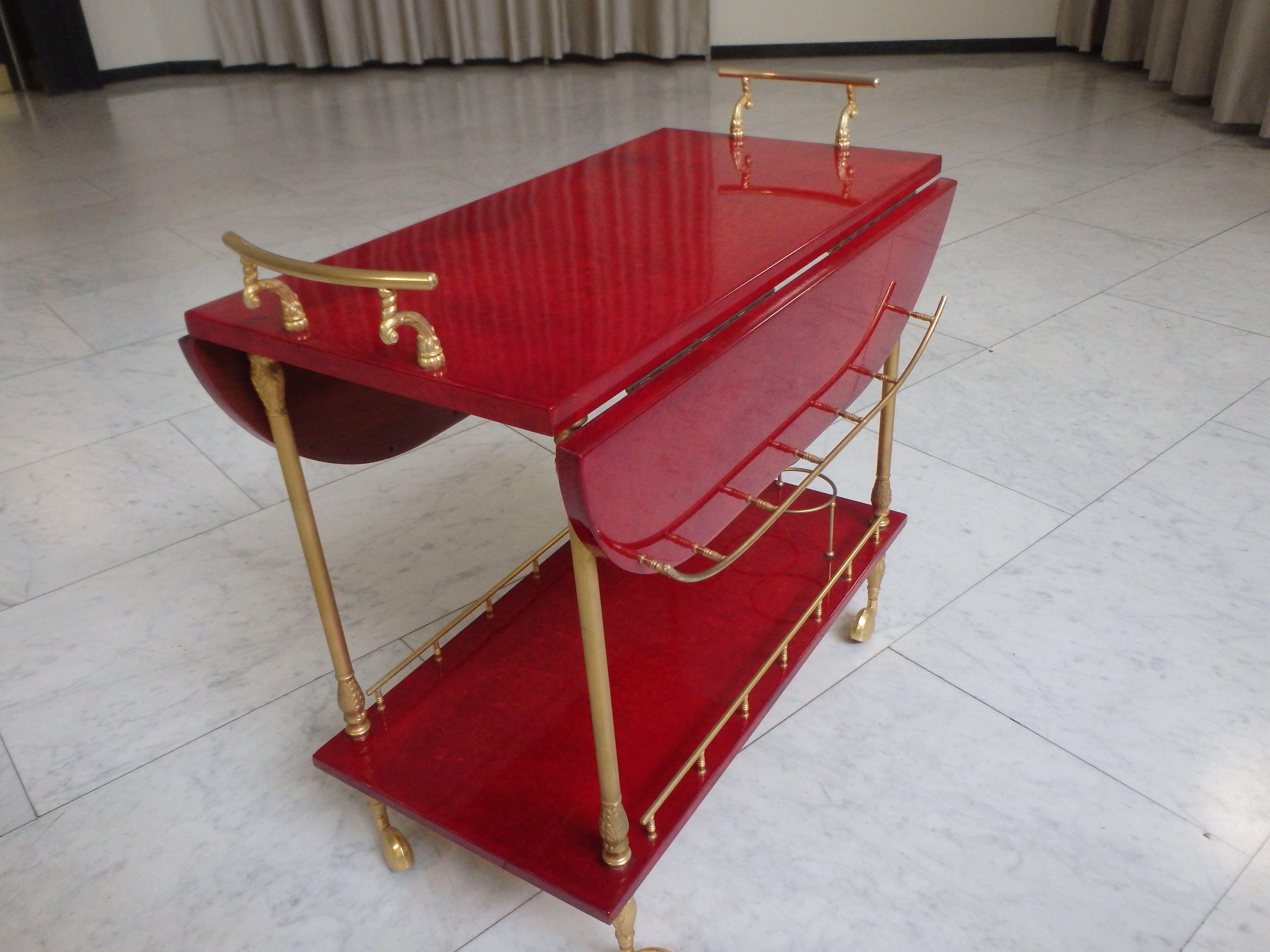 vibrant red coat skin bar cart by ALDO TURA with wings to be opend For Sale 1