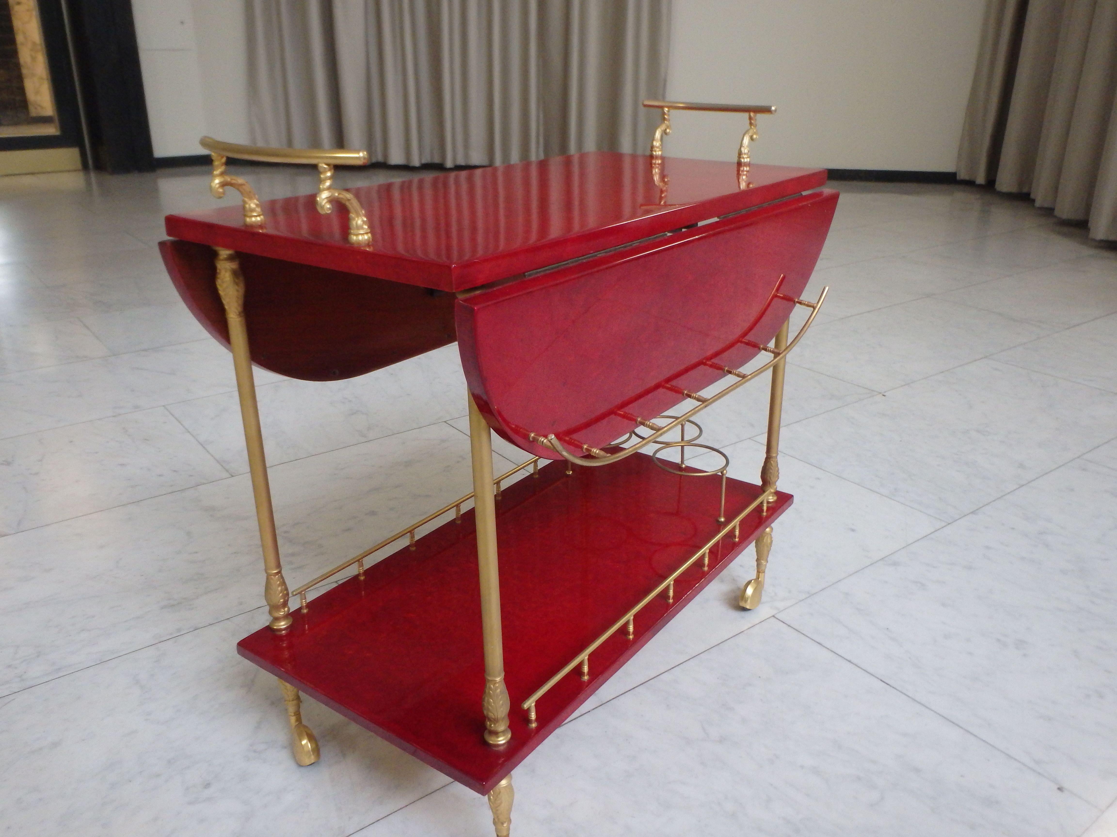vibrant red coat skin bar cart by ALDO TURA with wings to be opend For Sale 2