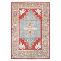Una alfombra turca de Ushak llena de colorido - Alfombra de lana hecha a mano en azul claro y rojo coral, 7x10