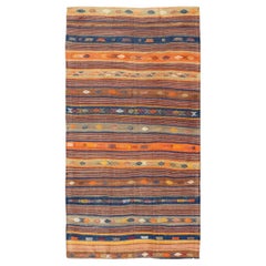 Vibrante alfombra turca Kilim Vintage con motivos geométricos