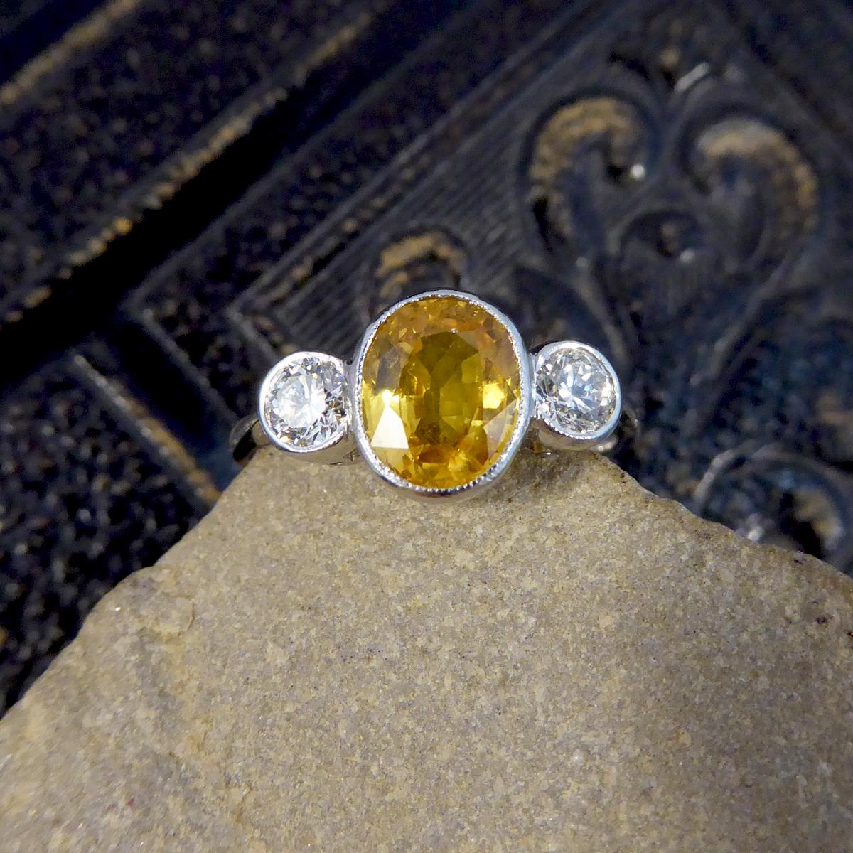 Vibrant Yellow Sapphire and Diamond Three Stone Ring in Platinum 1