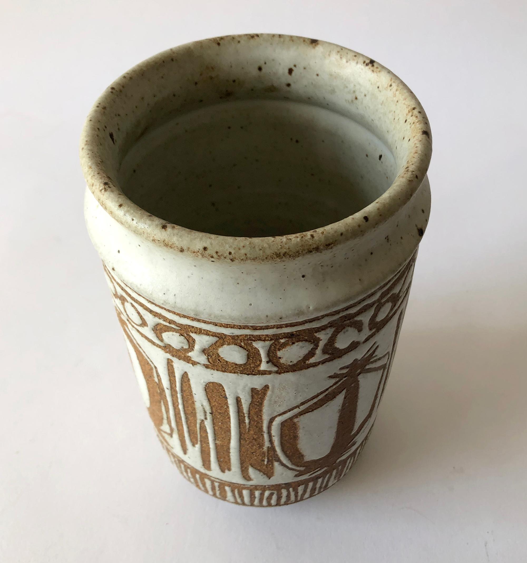 wax resist designs on pottery