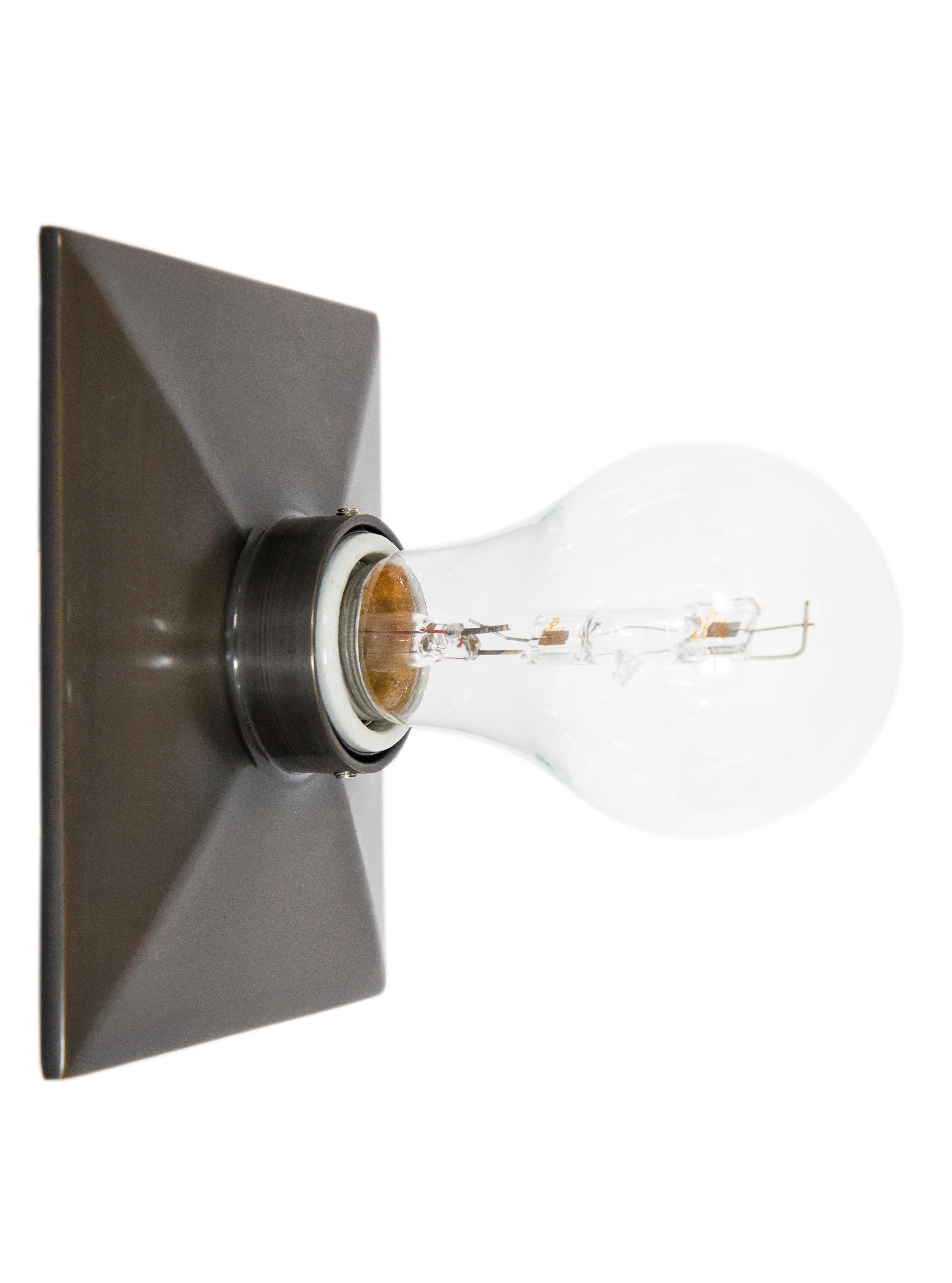 The Vica light is a rectangular cast metal escutcheon plate with a beveled edge design and porcelain socket. The fixture can be wall or ceiling mounted.

The maximum wattage bulb recommended is 60W. The vica light is UL listed.

Handcrafted in