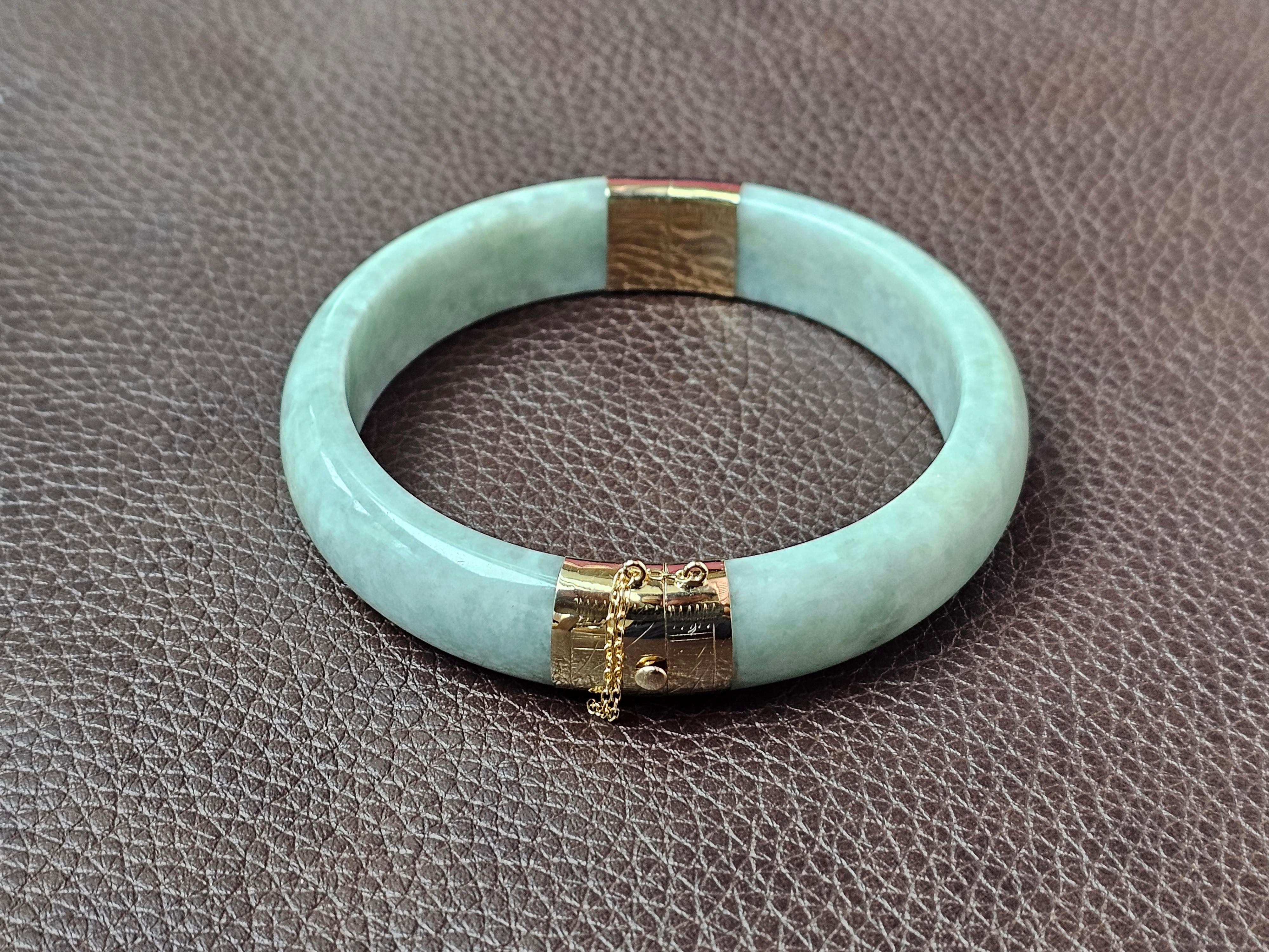 Using the best Handpicked untreated natural Jadeite from Burma, we created an authoritative and classy statement bangle bracelet. The 'Viceroy's Circular Burmese Jade Bangle Bracelet' accentuates the Gold and Jade Elements by displaying perfect
