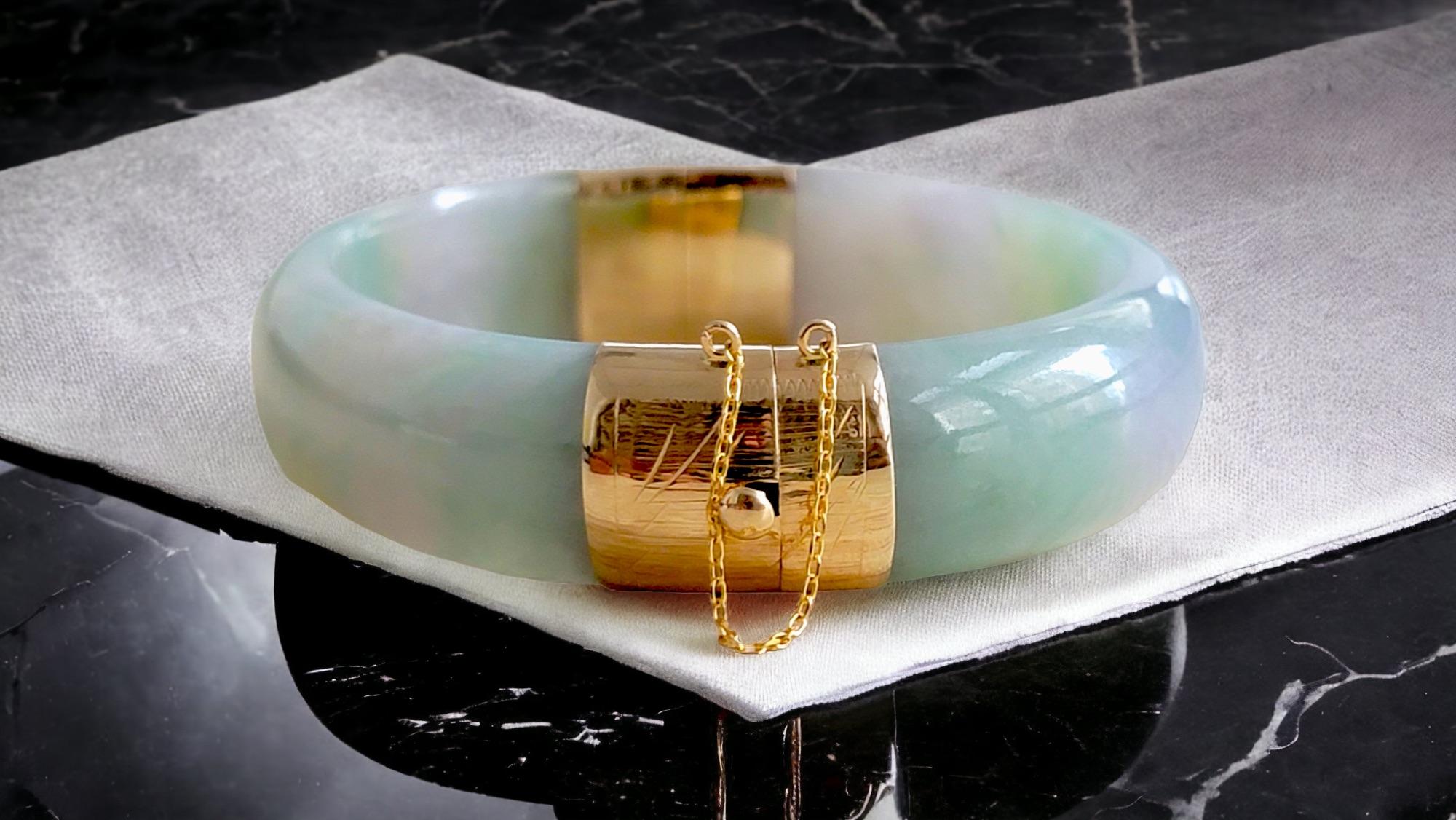 Using the best Handpicked untreated natural Jadeite from Burma, we created an authoritative and classy statement bangle bracelet. The 'Viceroy's Elliptical Burmese Jade Bangle Bracelet' uses an ergonomic ellipsis shape to fit one's wrists at an