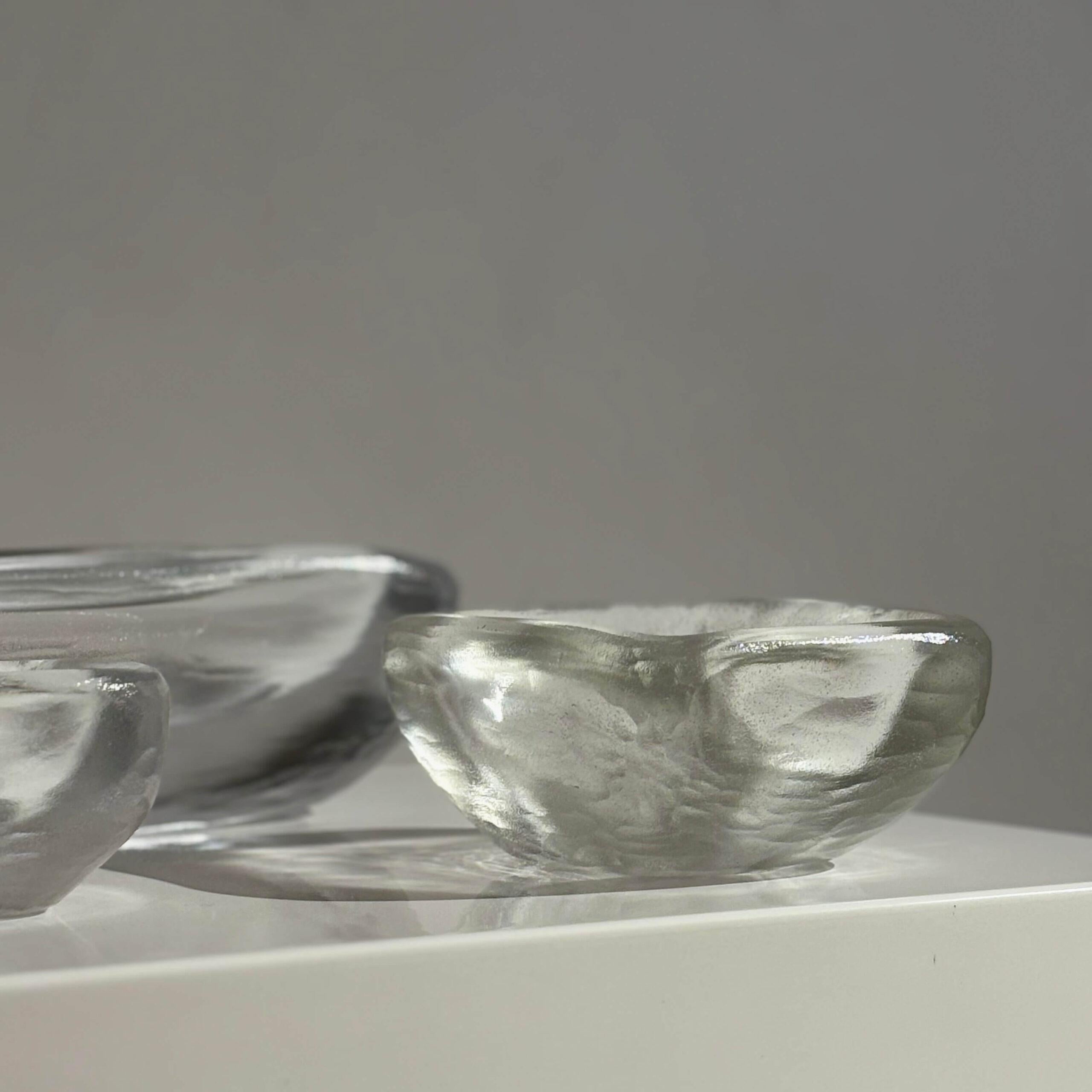 Mid-20th Century Vicke Lindstrand for Orrefors Carved Glass Bowls For Sale