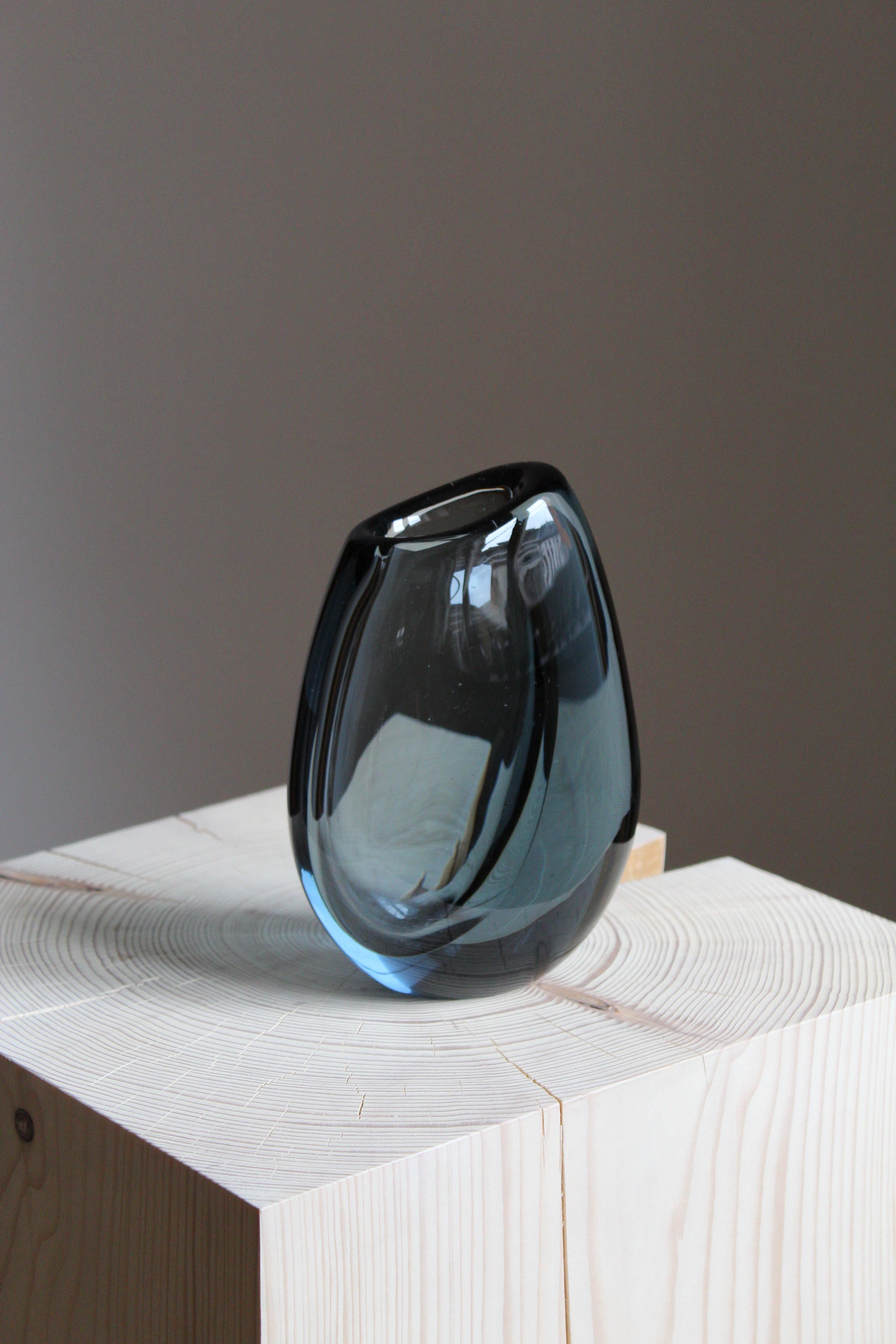 An organic blown glass vase. Designed by Vicke Lindstrand, produced by Orrefors, Sweden, circa 1940s. Signed.

  