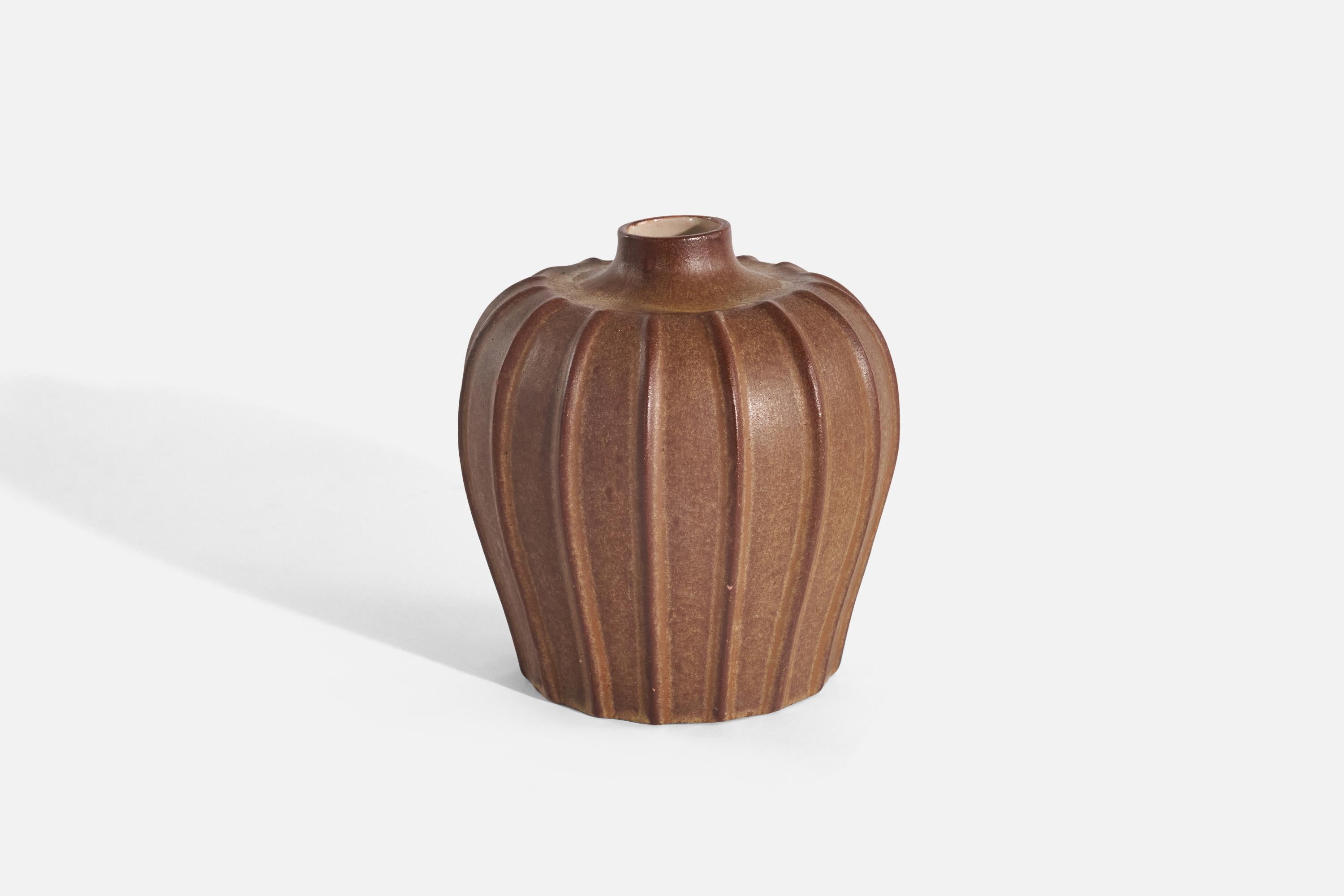 A brown, glazed earthenware vase designed by Vicke Lindstrand and produced by Upsala-Ekeby, Sweden, c. 1940s. 

