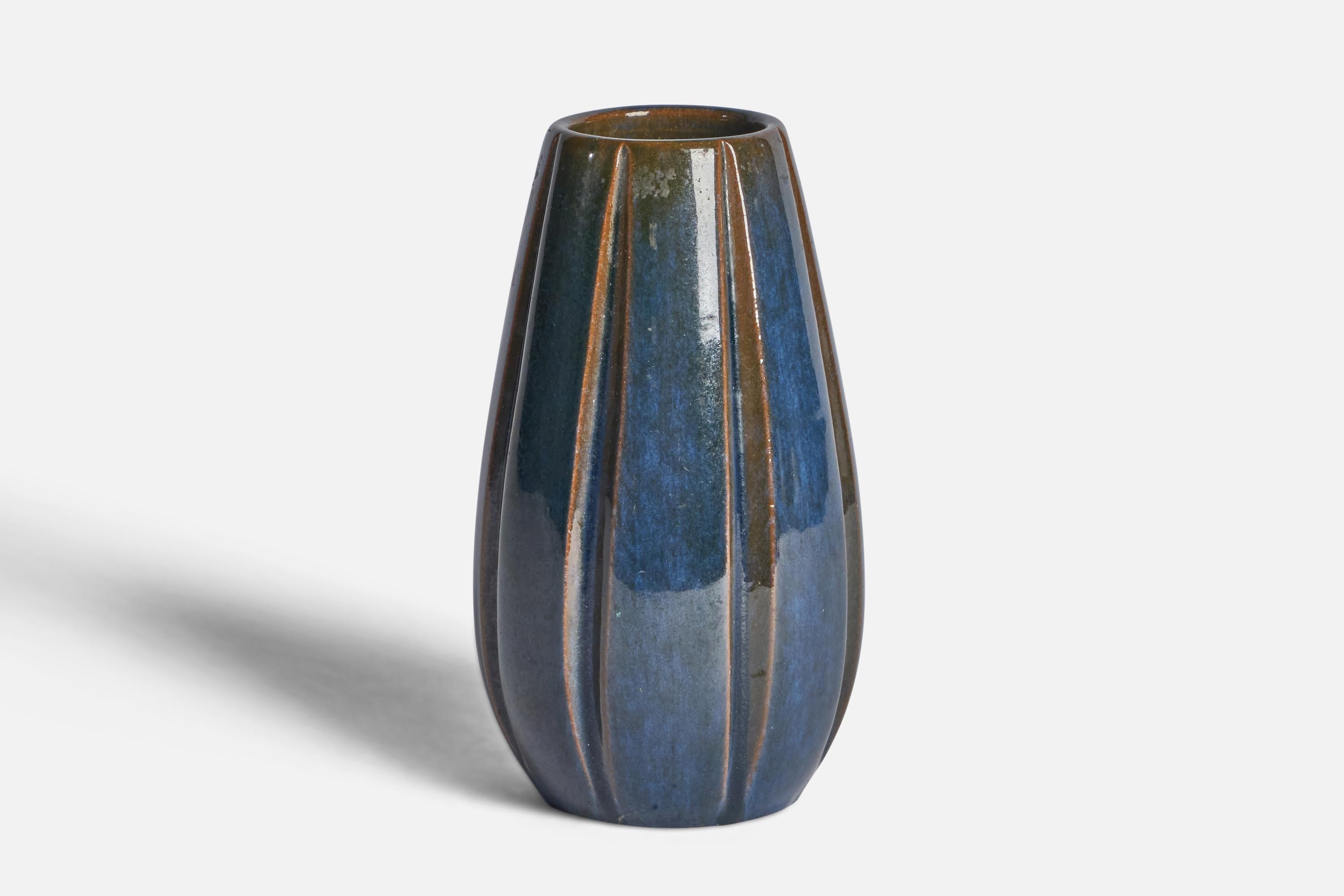 A blue and brown-glazed earthenware vase designed by Vicke Lindstrand and produced by Upsala Ekeby, Sweden, 1930s.