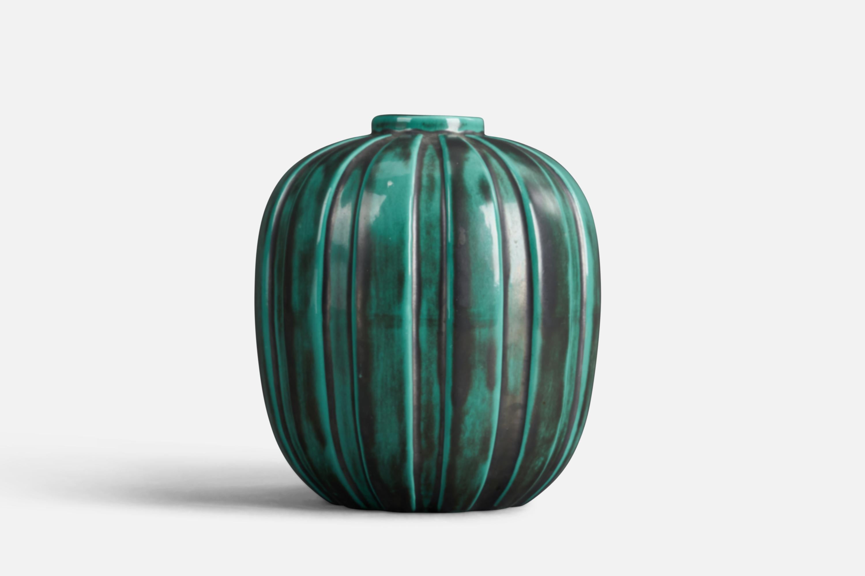 A green-glazed earthenware vase designed by Vicke Lindstrand and produced by Upsala Ekeby, Sweden, 1930s.