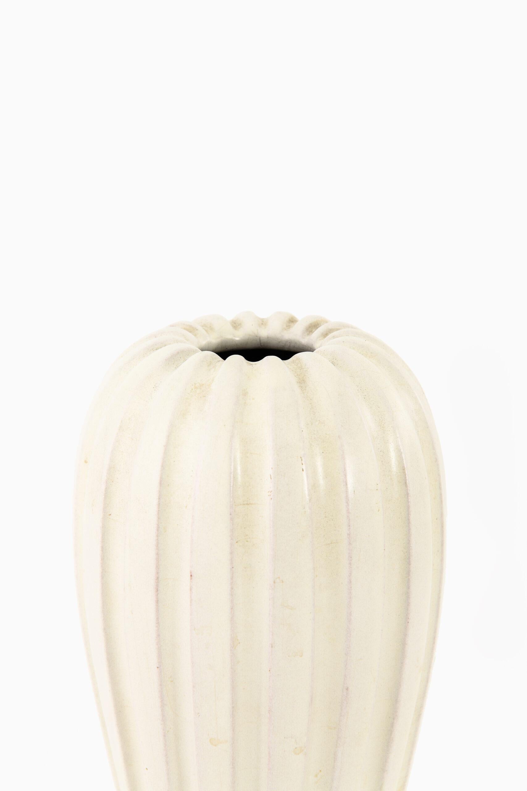 Rare vase designed by Vicke Lindstrand. Produced by Upsala Ekeby in Sweden.
