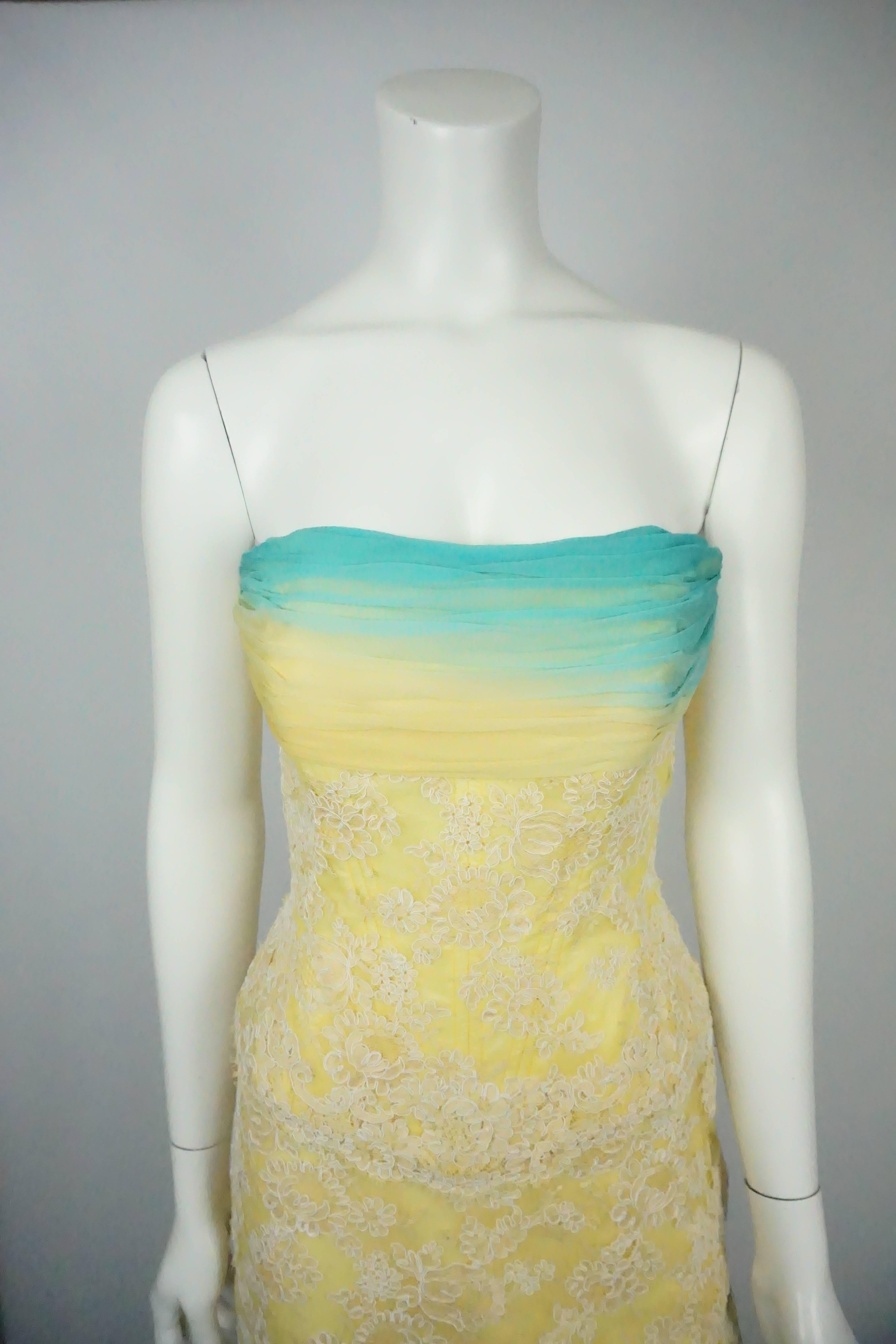 Vickey Tiel Couture Yellow & Turquoise Lace and Silk Gown w/ Shawl - 6  This vibrant piece is made up of silk and lace. It is a strapless dress that has a silk trim in the front. The dress has a corset like top with an A-line skirt. It is silk lined