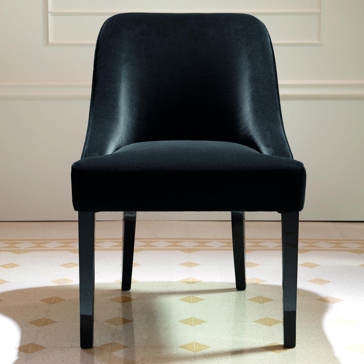 Part of the Vicky Collection, this elegant dining chair is one of the first creations by Domenico Mula for DOM Edizioni. Distinctive for its minimalist and sober design, this is a timeless and refined accent to add in a modern study or a classic