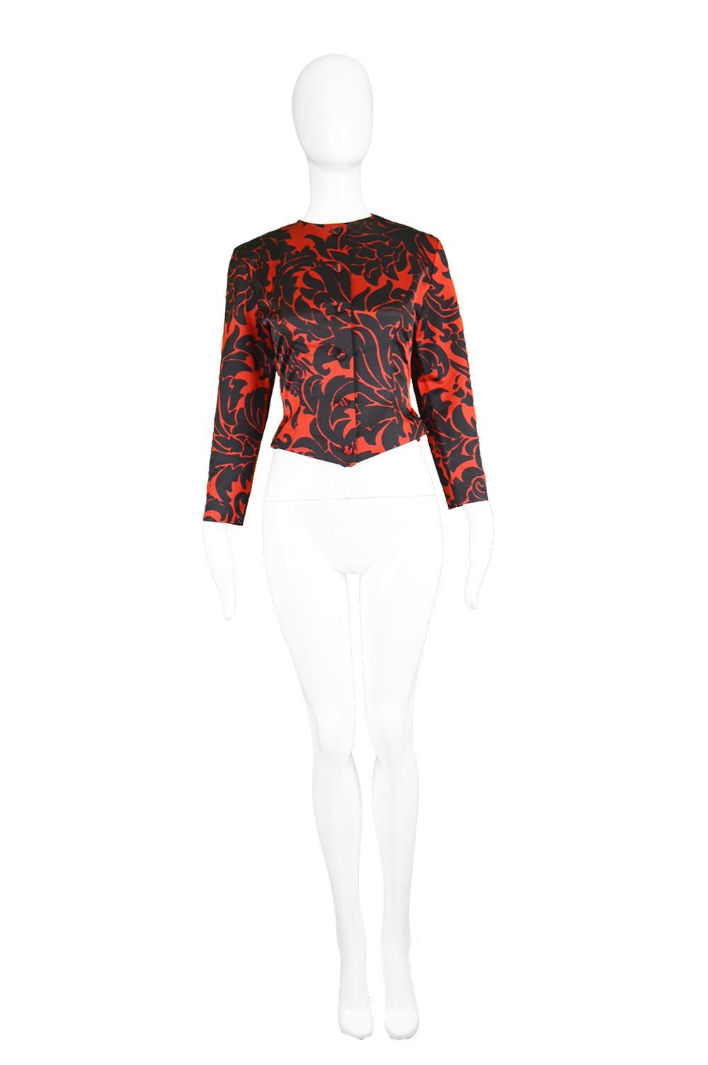 Vicky Tiel Couture Vintage Red & Black Fitted Damask Patterned Jacket, 1980s

Estimated Size: women's UK 8/ US 4/ EU 36. Please check all measurements. 
Bust - 32” / 81cm
Waist - 26” / 66cm
Length (Shoulder to Hem) - 18” / 46cm
Shoulder to Shoulder