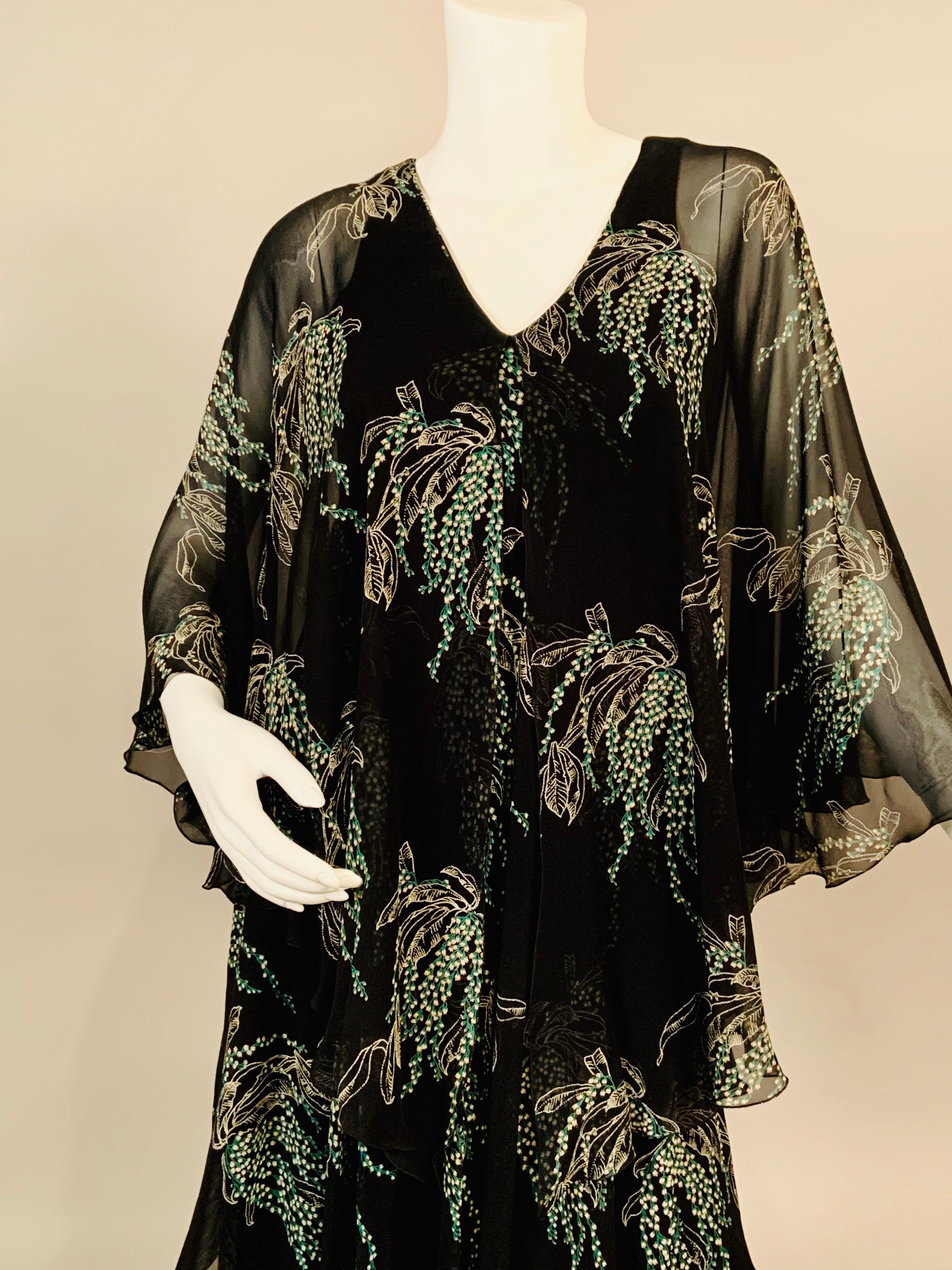 Vicky Tiel was an American designer in Paris for many years. This dress is from her boutique on the rue Bonaparte. The construction is very clever. She has used a black silk jersey slip dress underneath and three cascading layers of black silk