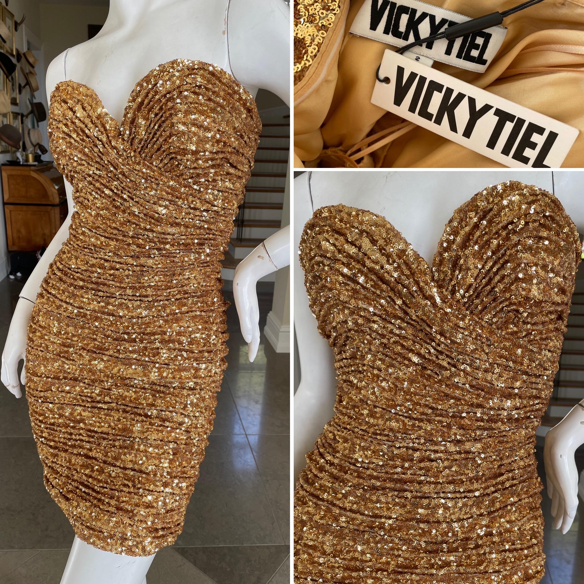 Vicky Tiel Paris Sensational 80's Gold Sequin Strapless Cocktail Dress.
Unworn with tags.
The witty quote was 