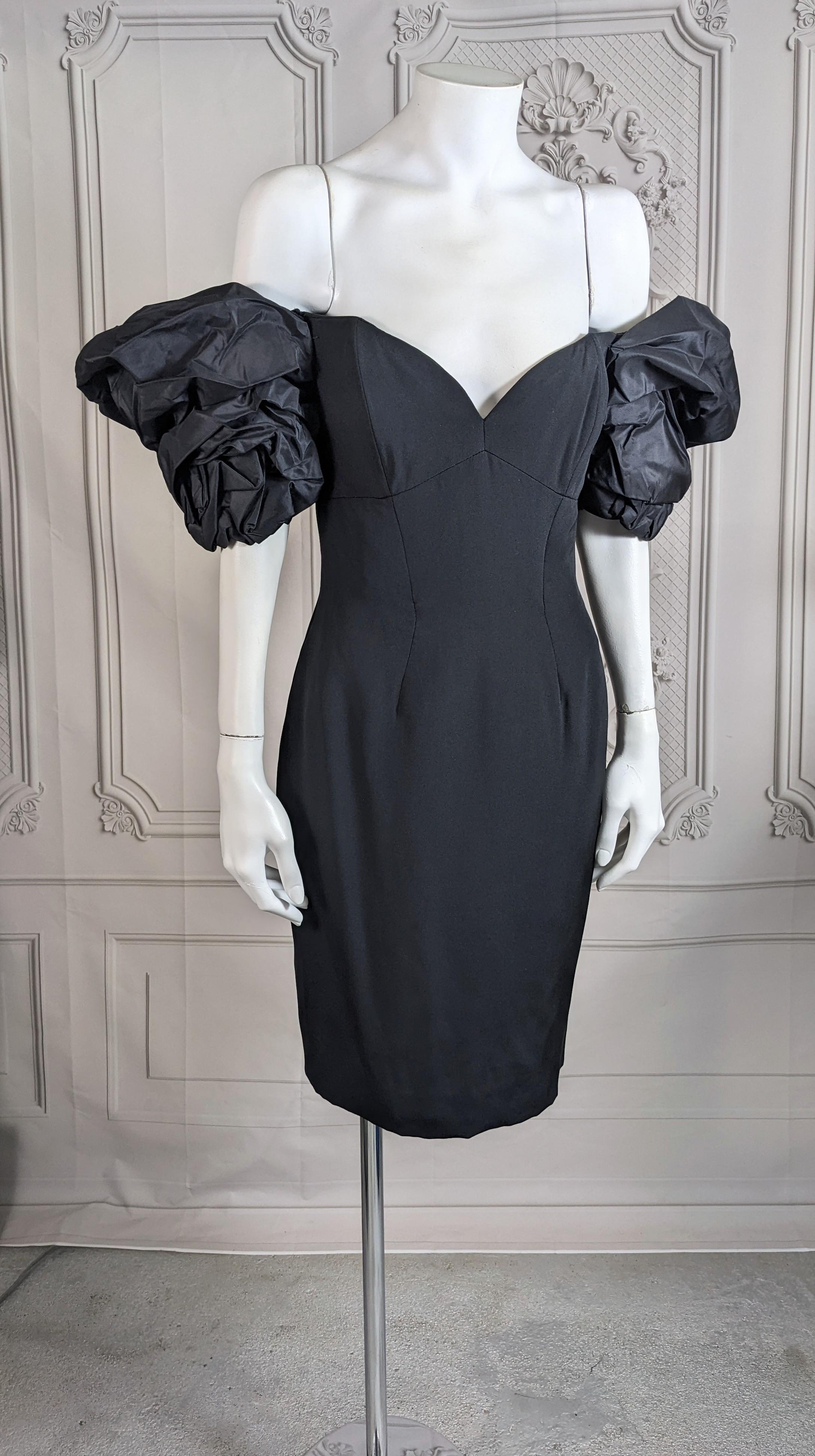 Vicky Tiel, Paris Silk Crepe and Taffeta Strapless Dress from the 1990's. Heavy silk crepe with paper silk taffeta ruched, exaggerated puff sleeves. Interior boning, simple and elegant. 1990's France. Size 40.