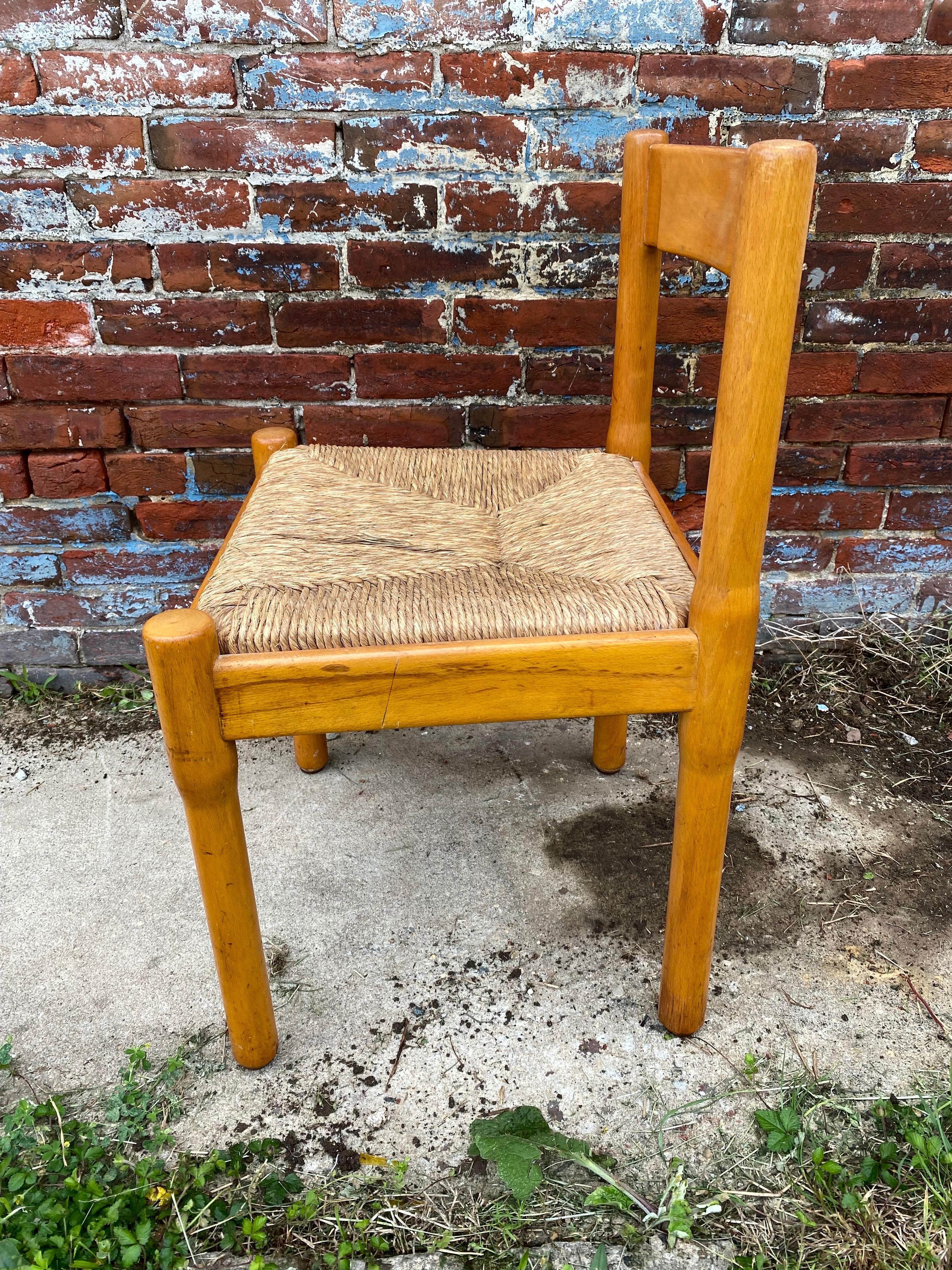 Vico Magistretti Side Chair in Beech with Rushed Straw seat. All original, 6 arm chairs listed in a separate listing.
