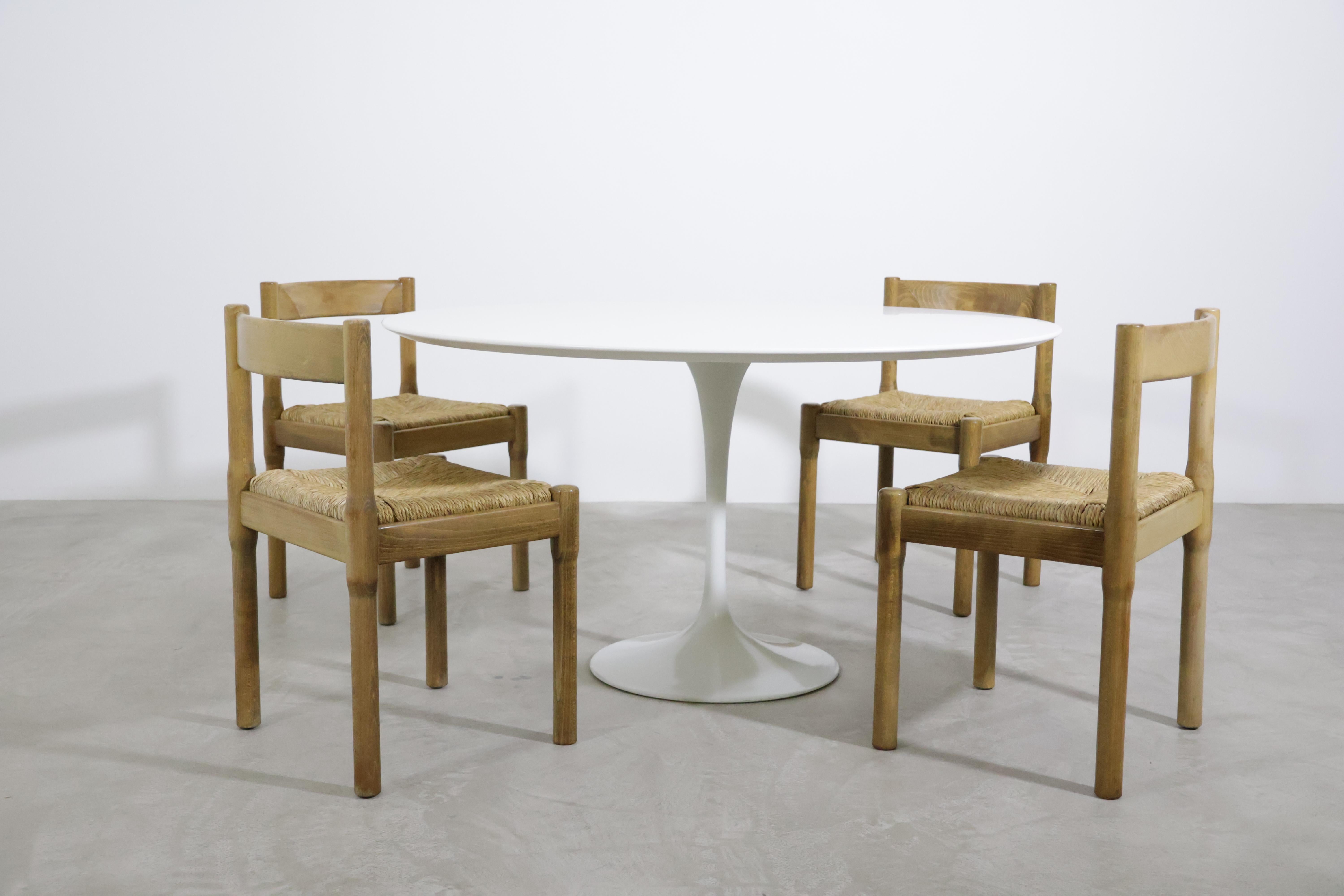 A beautiful set of 12 'Carimate' dining chairs by Vico Magistretti for Mario Luigi Comi/Italy in the 60s!
The 'Carimate' chair is one of Vico Magistretti's most famous chair and for him, rather unsual, as his furniture is better known for the