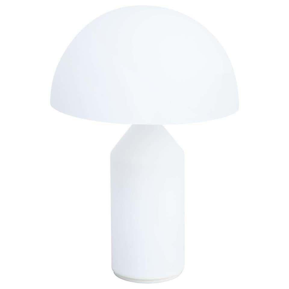 Table lamp designed by Vico Magistretti in 1977
Manufactured by Oluce, Italy.

Designed in 1977 by Vico Magistretti, over the years, Atollo has become the archetype of the table lamp, winning the Compasso d’Oro in 1979 and completely revolutionizing