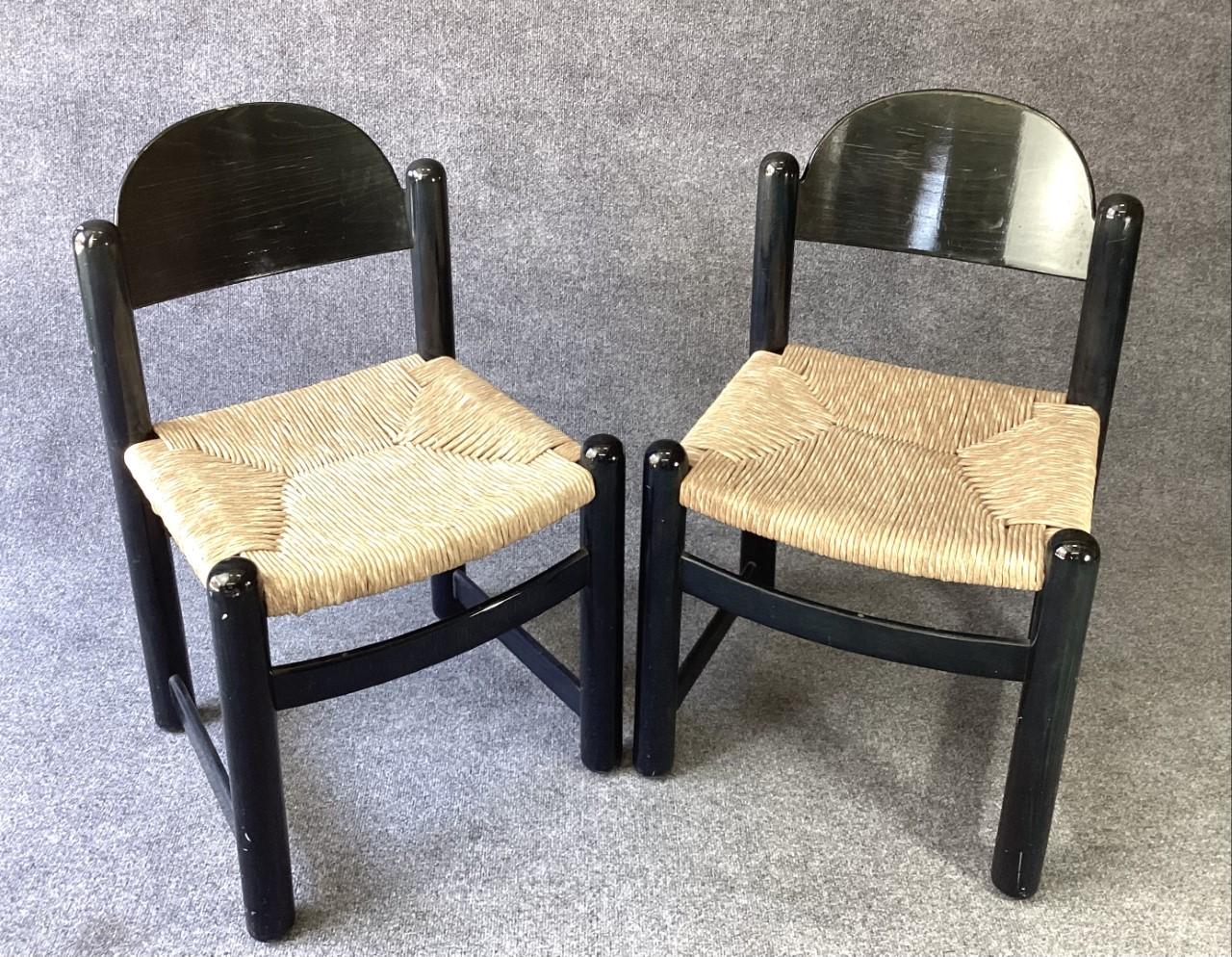 A very cool paper of very well preserved side chairs attributed to the iconic master designer, Vico Magistretti. These super stylish chairs have solid beech wood fames with a dark blue/green dyed-color and a stain sheen protective finish. The seats