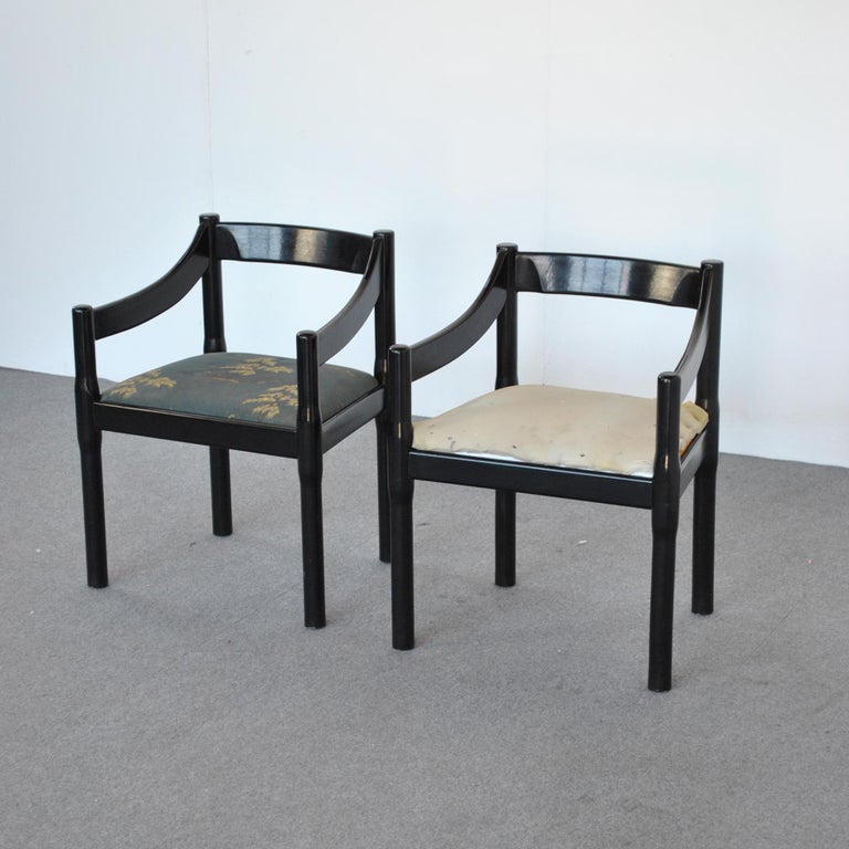 Pair of carimate model seats designed by Vico Magistretti for Cassina from the 1970s.

The name of the series is due to the original destination of the chair, designed for the Club House of the Carimate Golf Club, Como. The chair takes inspiration