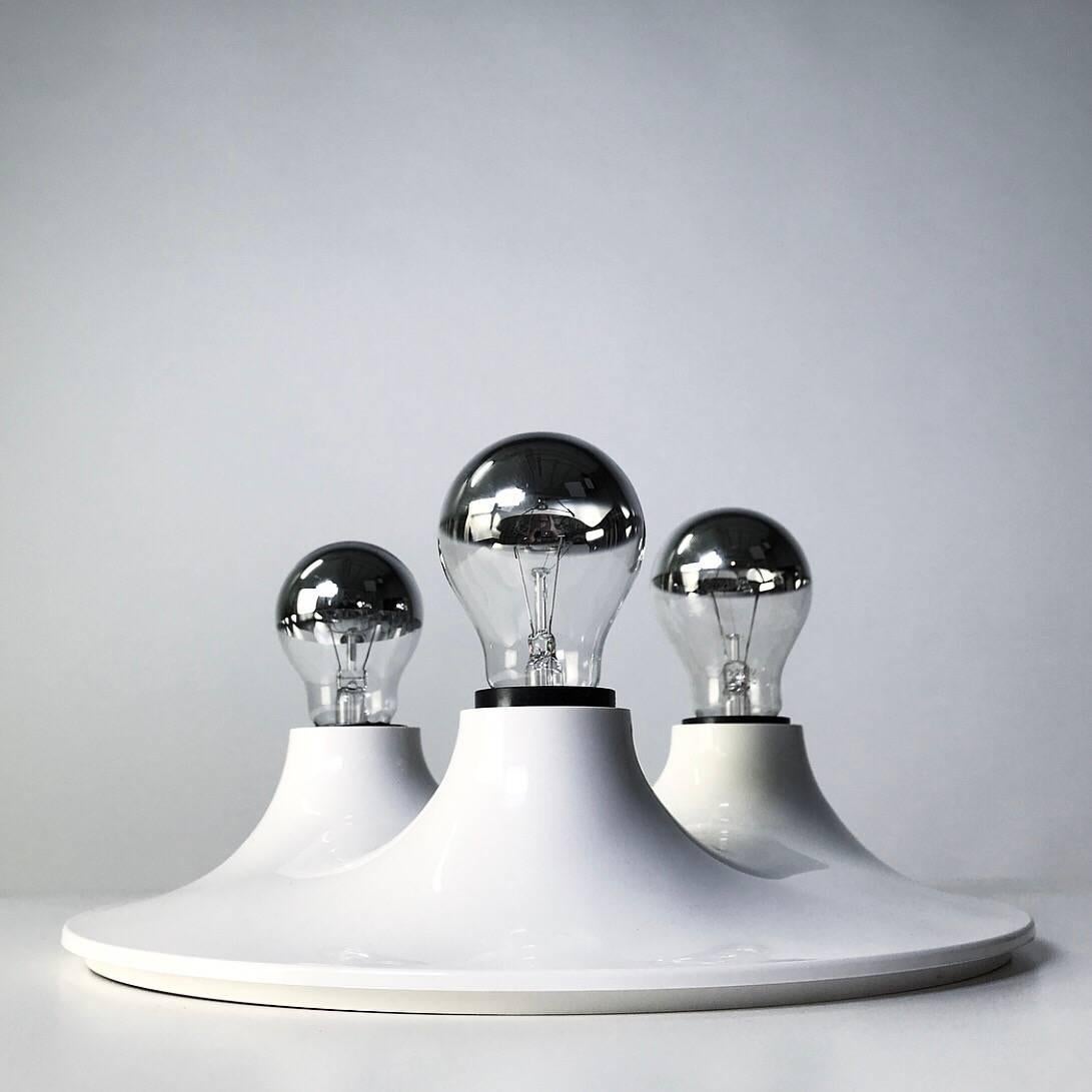 Beautiful contemporary light fixture Triteti by Vico Magistretti for Artemide, Italy, early 1970s. 

The Triteti is a well awarded piece of Italian design from 1967 and these two-light fixtures we do have is marked with “patent pending” which
