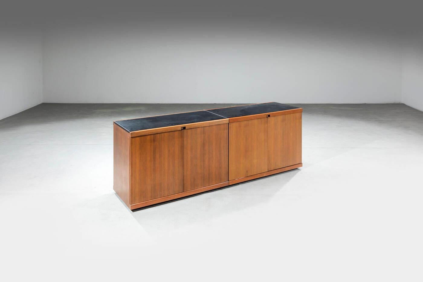 Pair of sideboards mod. MB55
Wood veneer frame with leather top.
Prod. Poggi, 1960s

Small defects and marks due to use. 

