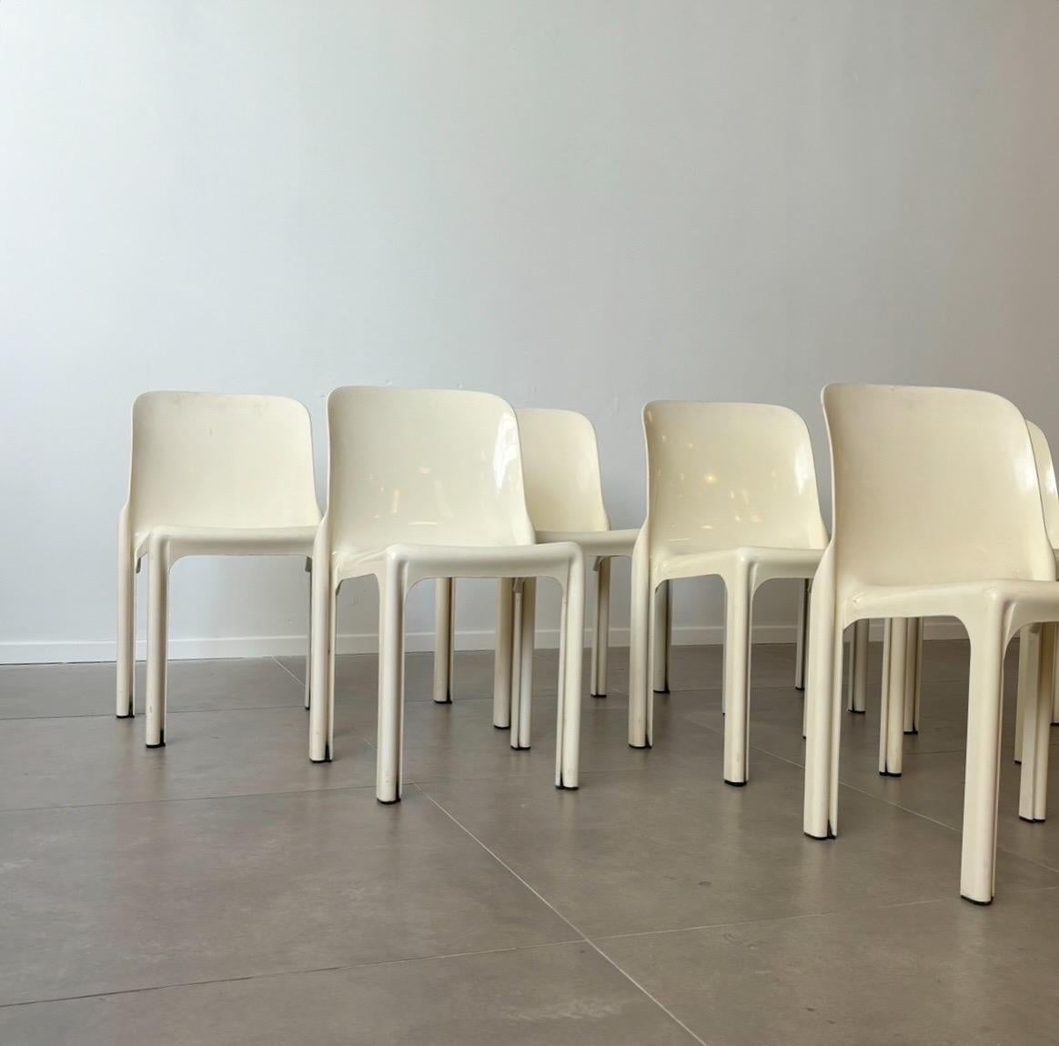 Vico Magistretti, a renowned Italian designer and architect, created the iconic 'Selene' chairs in 1969 for Artemide, a leading lighting and furniture company. These chairs, characterized by their sleek and minimalist design, are crafted from