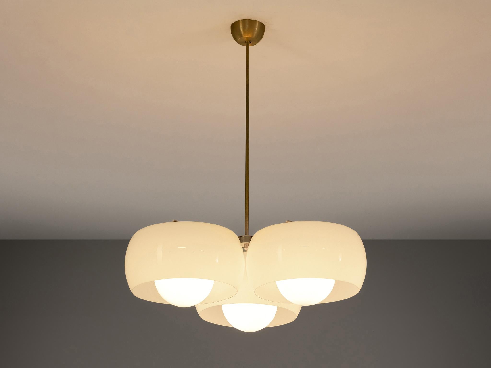 Vico Magistretti for Artemide, chandeliers model 'Triclinio', matt nickel-plated brass, opaline glass, Italy, design 1967

This charming chandelier features three intricate shades in opaline glass, hence the name ‘tri’. This version is part of the