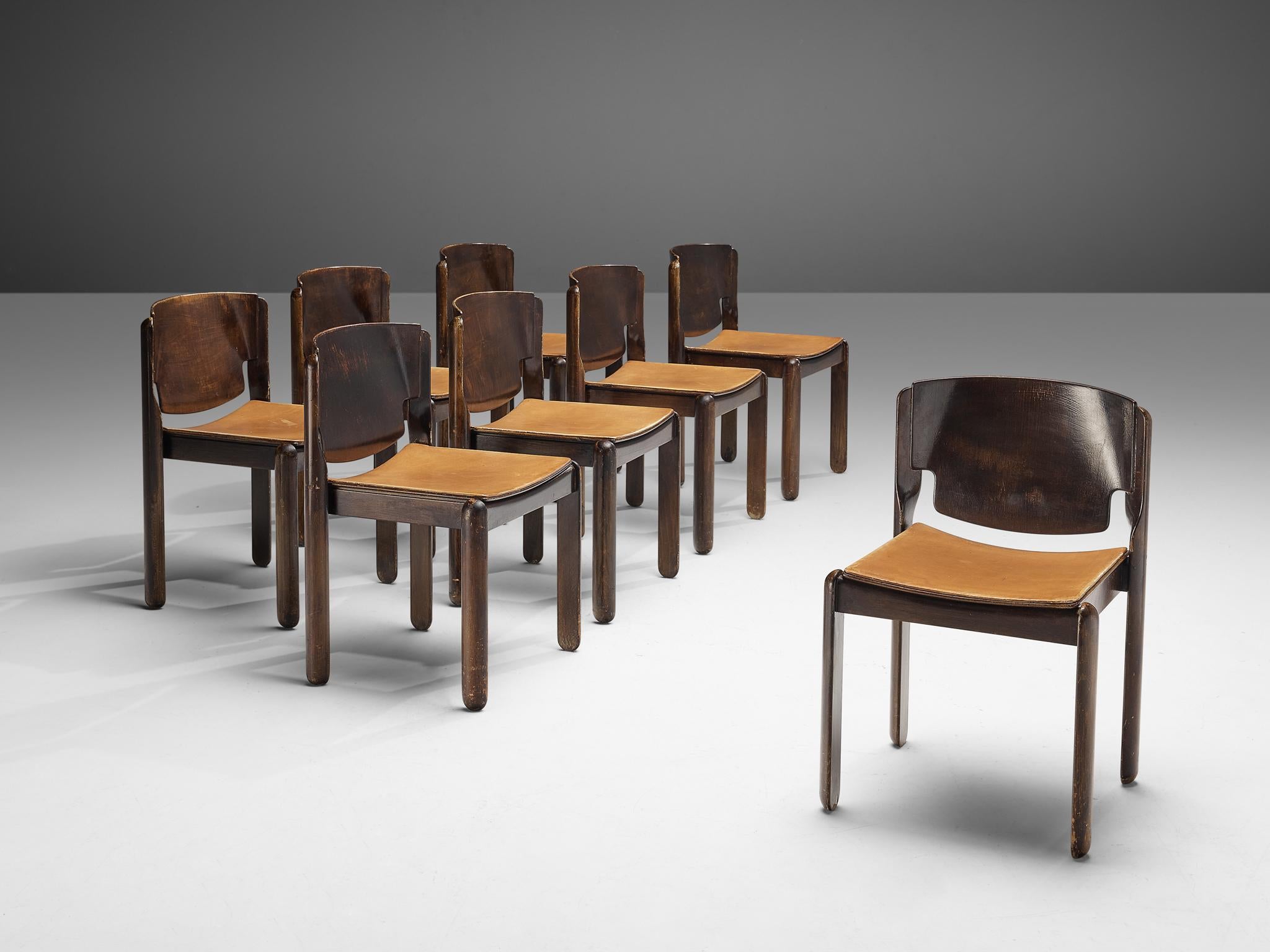 Vico Magistretti for Cassina, set of eight chairs, model '122', curved plywood, beech, Italy, 1967

Sculpted set of eight dining chairs, designed by Vico Magistretti. The patinated wooden chairs feature half cylindrical legs, that are rounded at