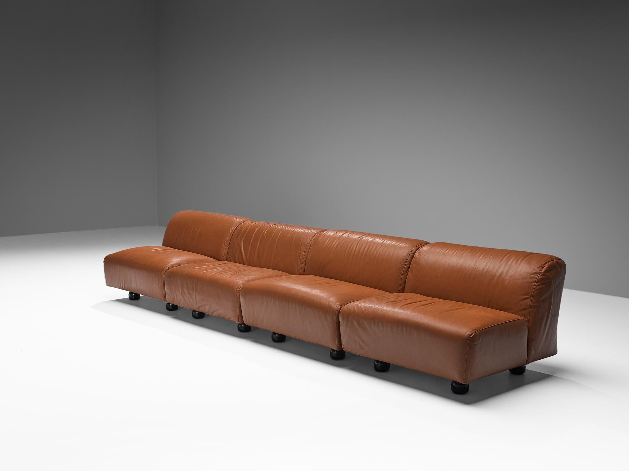 Vico Magistretti for Cassina, ‘Fiandra’ sectional sofa, leather, plastic, Italy, 1975 

This subtle and modest sofa is designed by the Italian designer Vico Magistretti (1920-2006) for Cassina and contains four modular elements. This means that it
