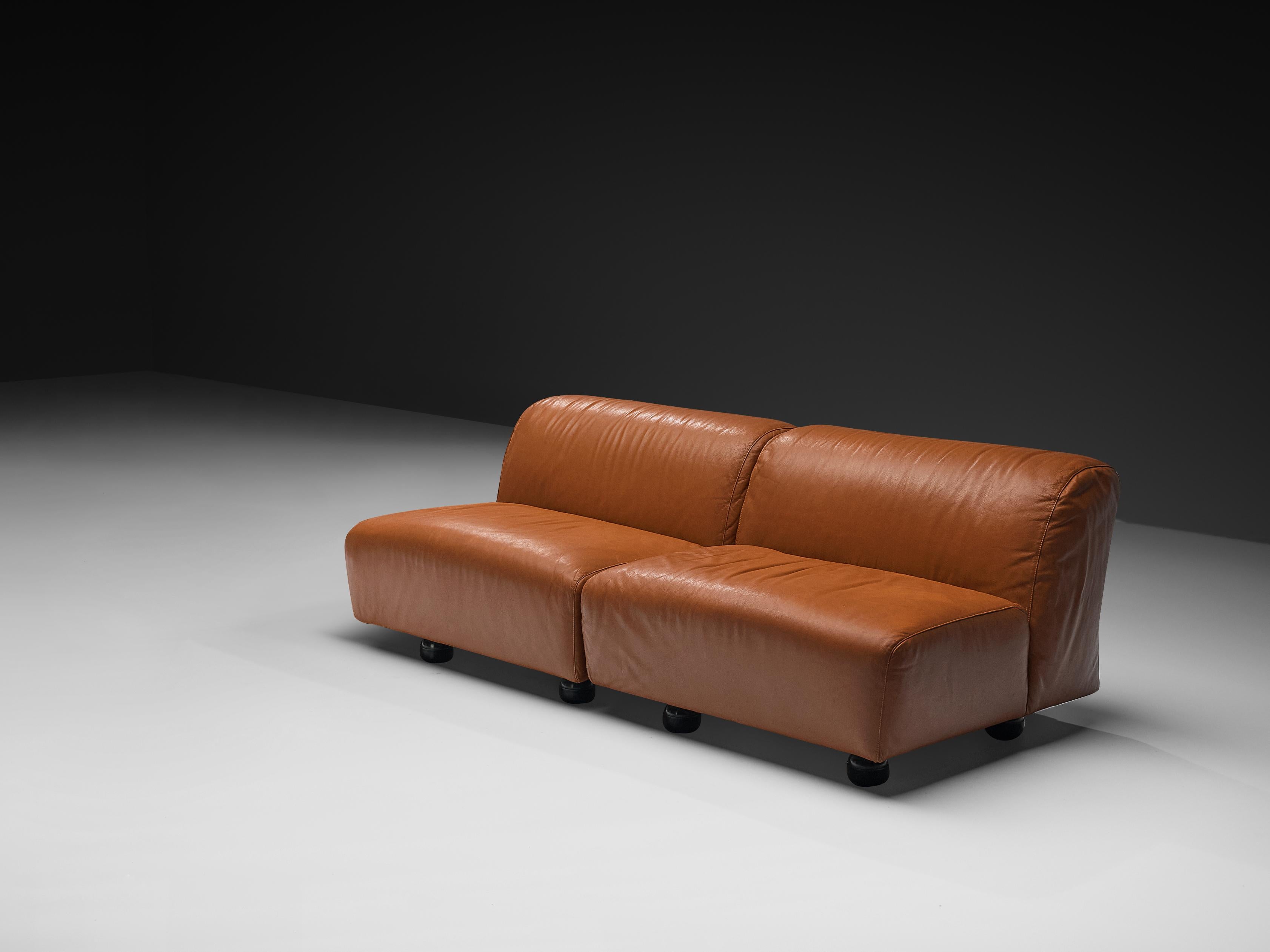 Vico Magistretti for Cassina, ‘Fiandra’ sectional sofa, leather, plastic, Italy, 1975 

This elegant and understated sofa was designed by renowned Italian designer Vico Magistretti (1920–2006) for Cassina. Comprising four modular elements, it offers