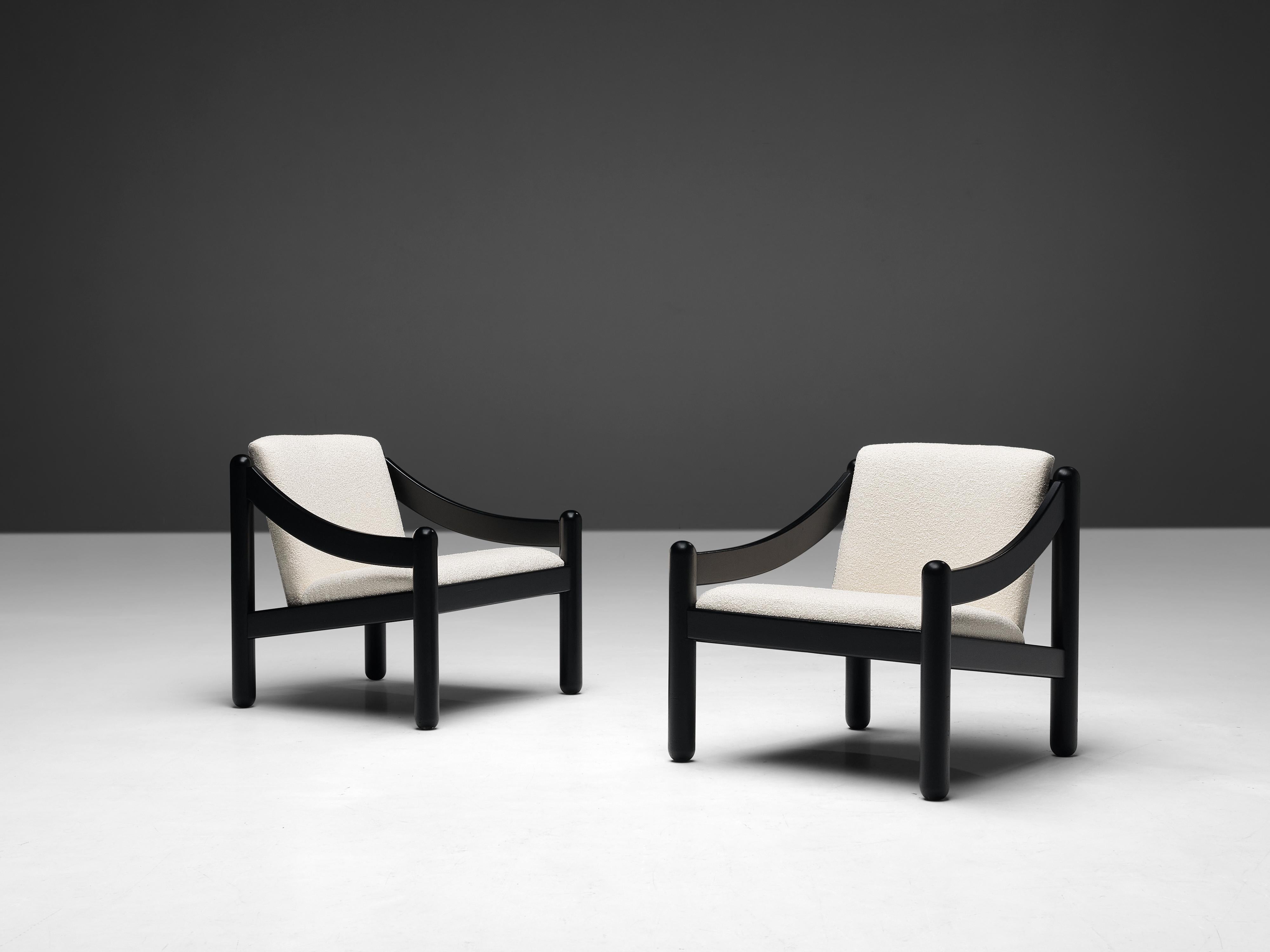 Vico Magistretti for Cassina, pair of ‘Carimate’ lounge chairs, lacquered beech, bouclé, Italy, designed circa 1960

The ‘Carimate’ lounge chair is one of Vico Magistretti’s most famous chairs. Originally, the chair had a red color and was designed