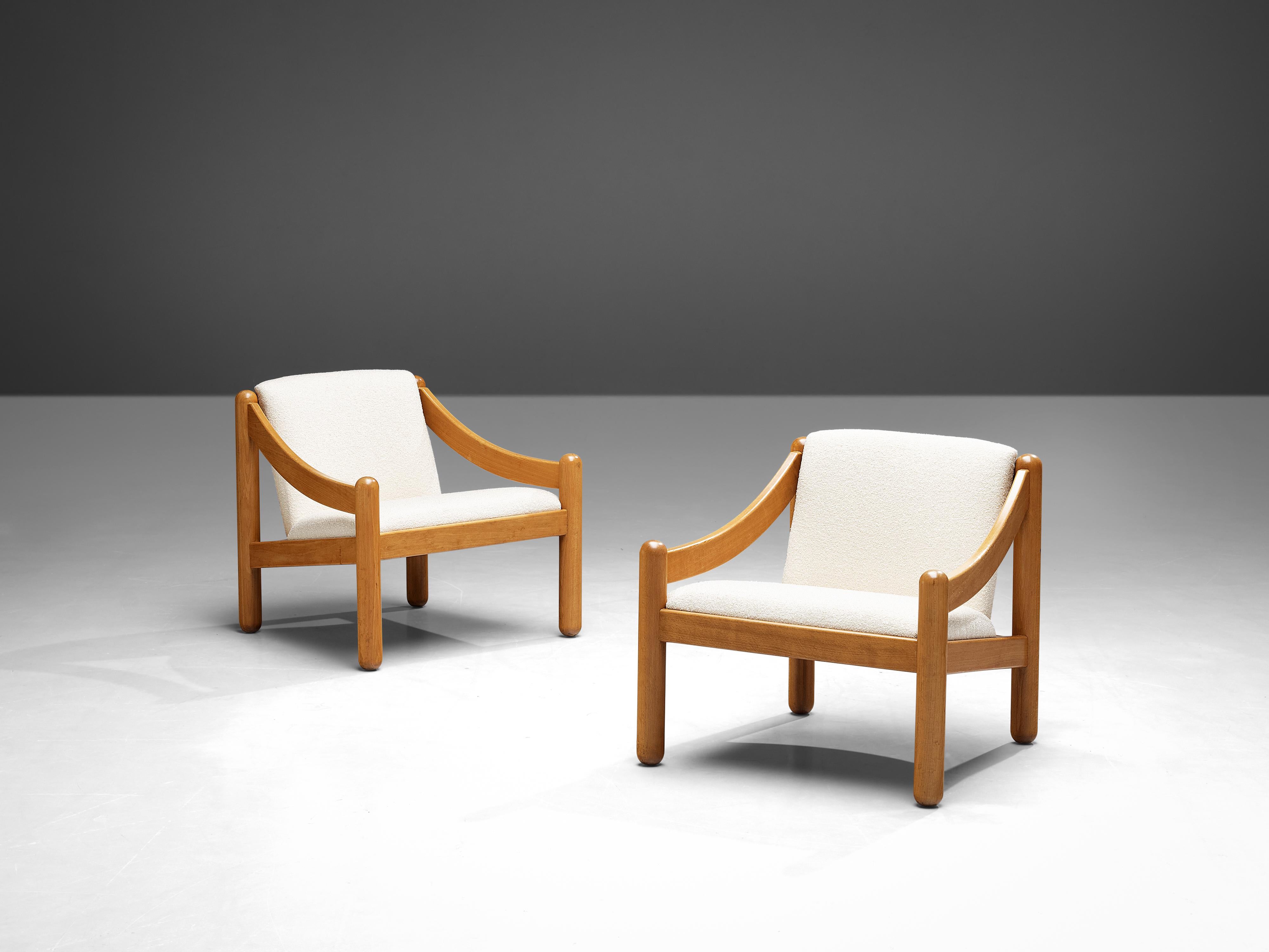 Vico Magistretti for Cassina, pair of ‘Carimate’ lounge chairs, beech, bouclé, Italy, designed circa 1960

The ‘Carimate’ lounge chair is one of Vico Magistretti’s most famous chairs. Originally, the chair had a red color and was designed for the