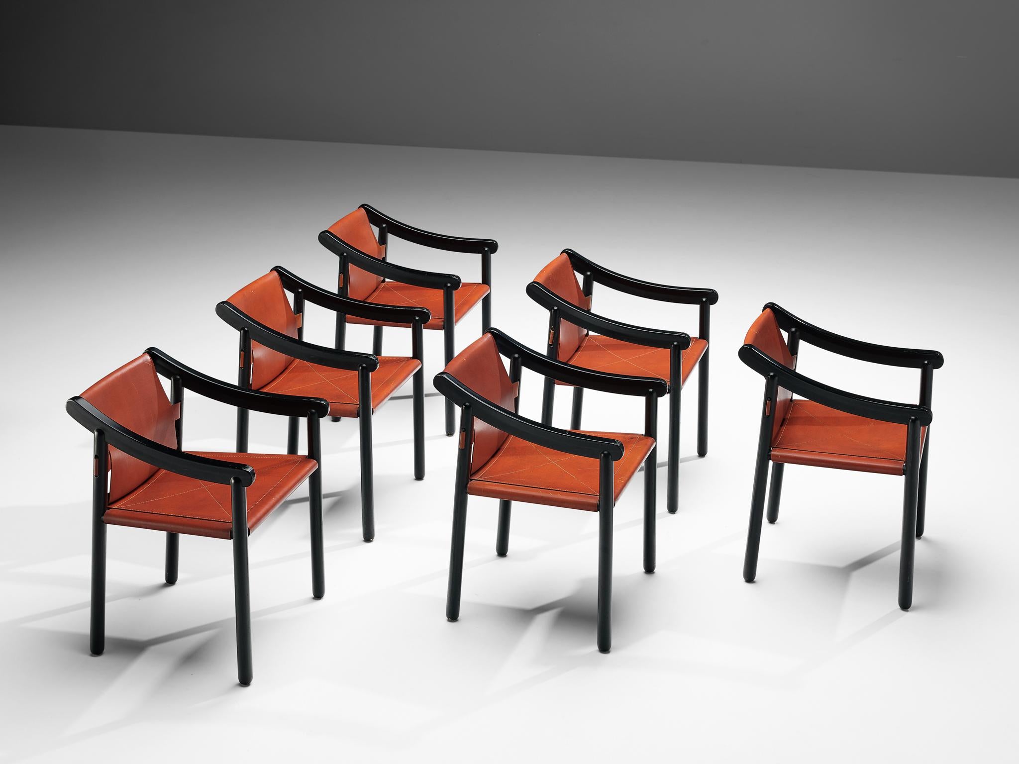Vico Magistretti for Cassina, set of six '905' armchairs, black lacquered wood and red leather, Italy, 1964.

Designed by Vico Magistretti and produced by Cassina, this set of chairs features the original elements of this early '905' model. The