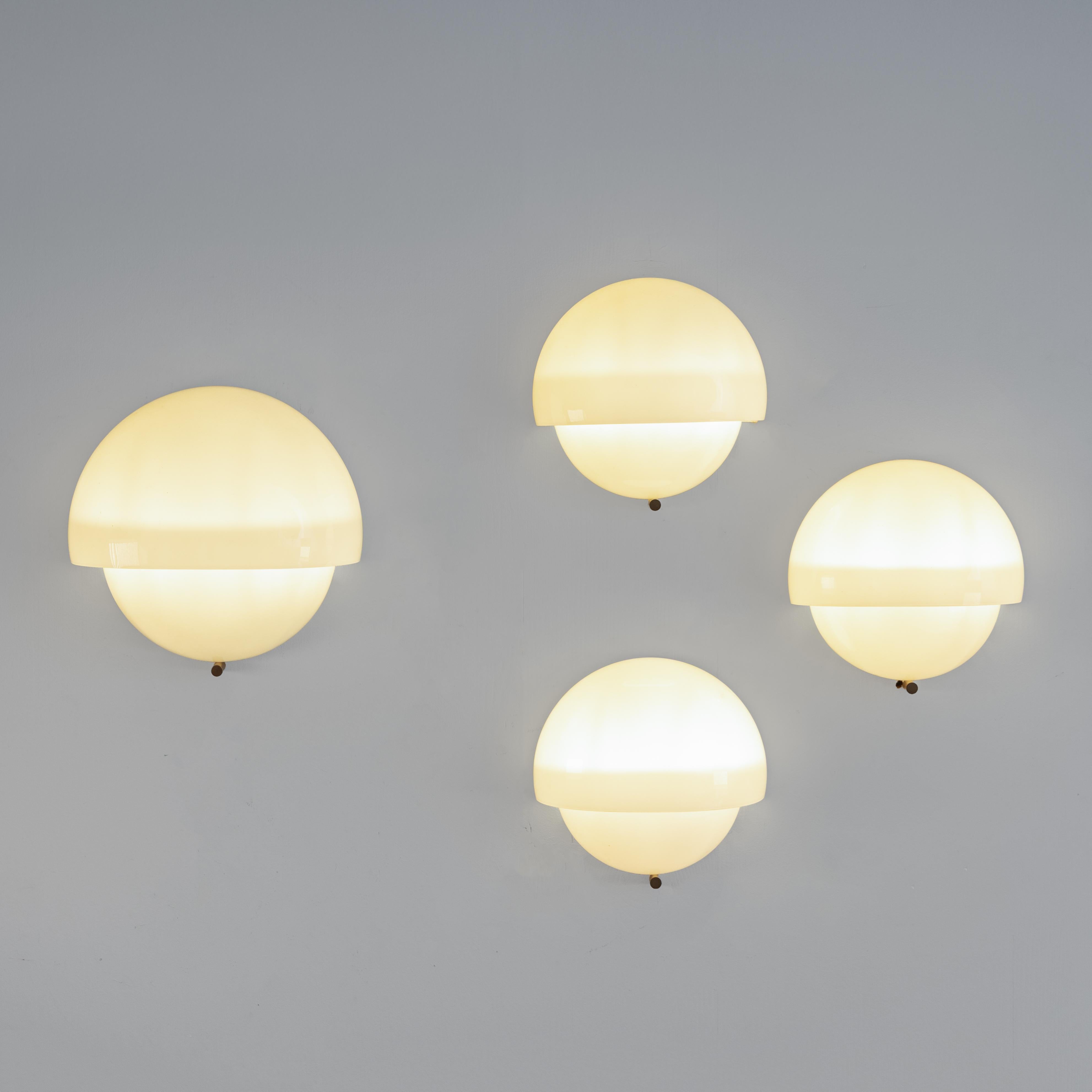 Set of 3 small Mania wall lamp, designed by Vico Magistretti for Artemide in Italy, designed in 1963, model with white Murano opal glass, 60s. This glass version stands out for its bold and contemporary aesthetic, with elegant lines and an imposing
